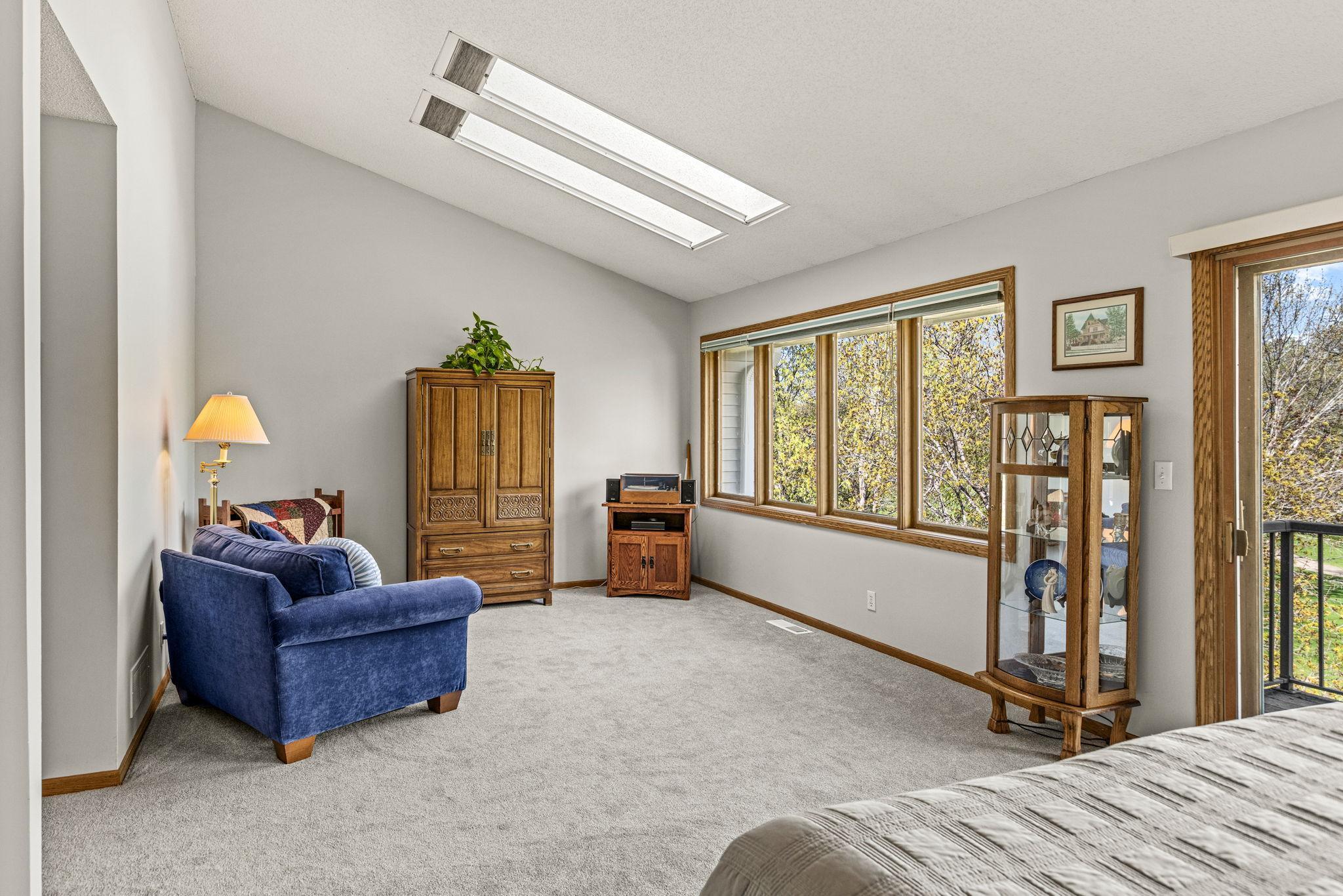 Skylights and vaulted ceilings add light and space to room! Views of nature too!