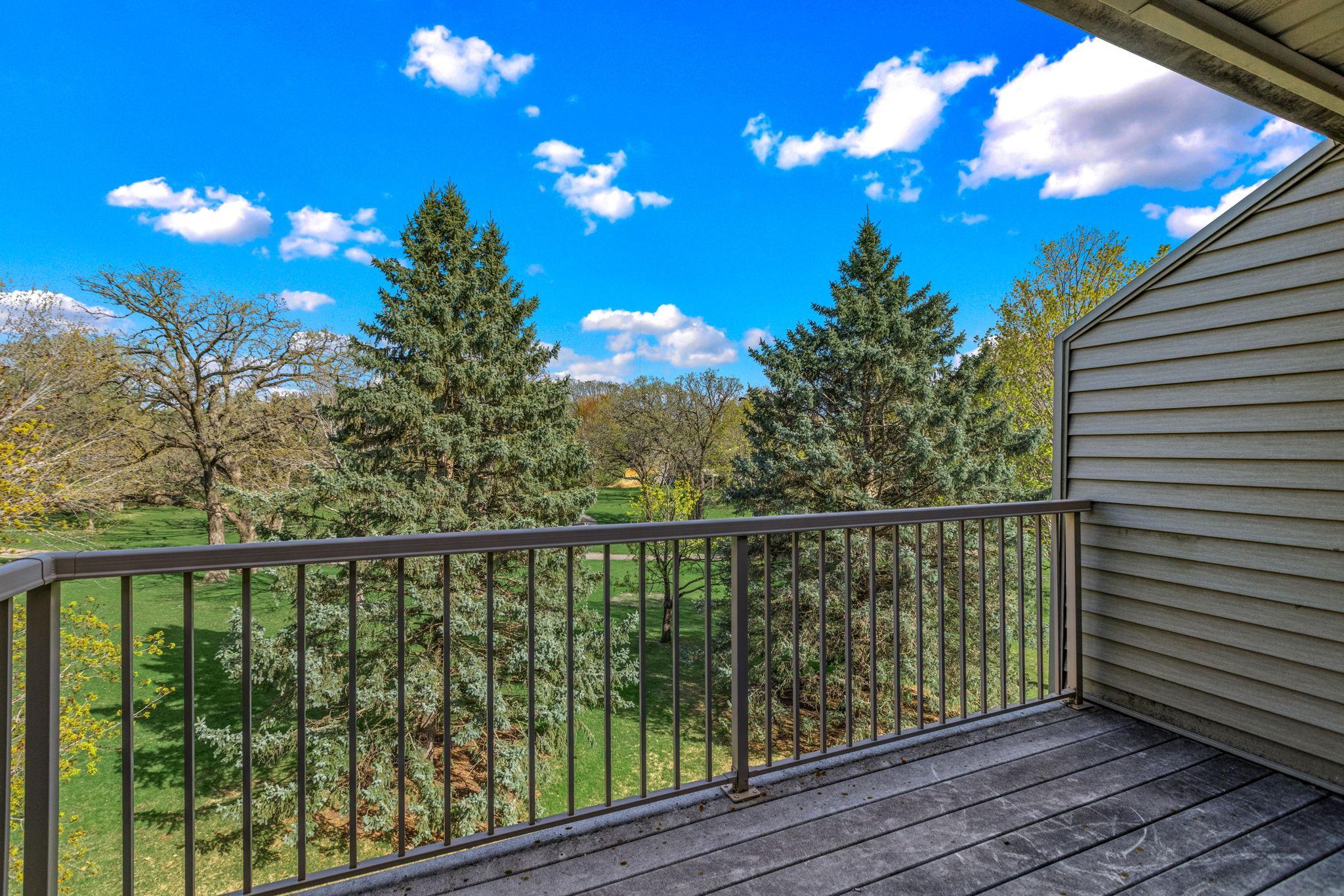 Primary suite private deck facing back and walking trails!
