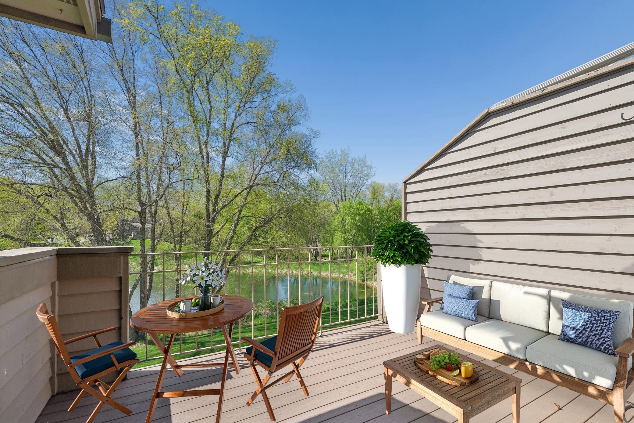Virtually staged spacious maintenance free deck