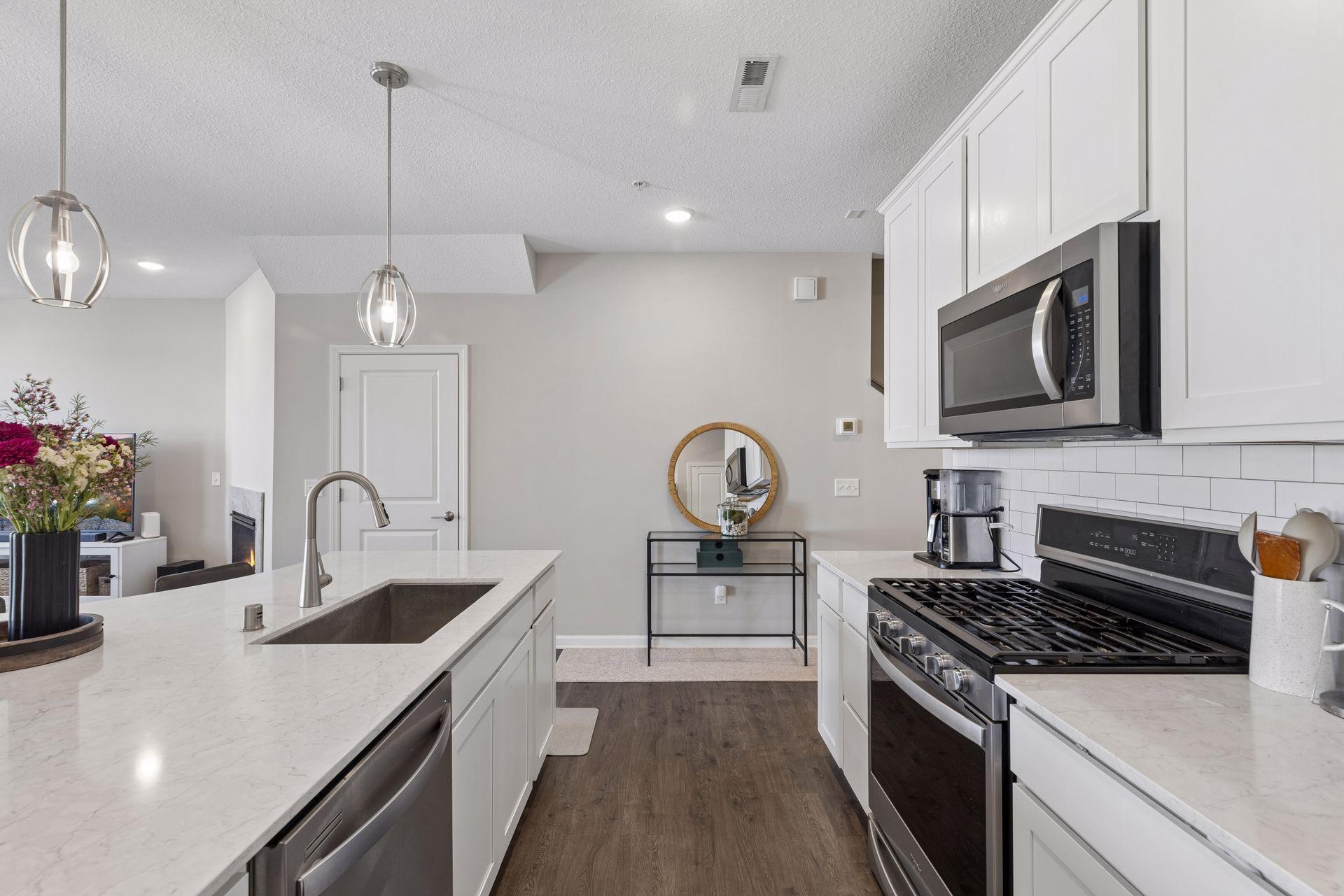 Kitchen workspace with ample counter space and functional design for meal preparation.