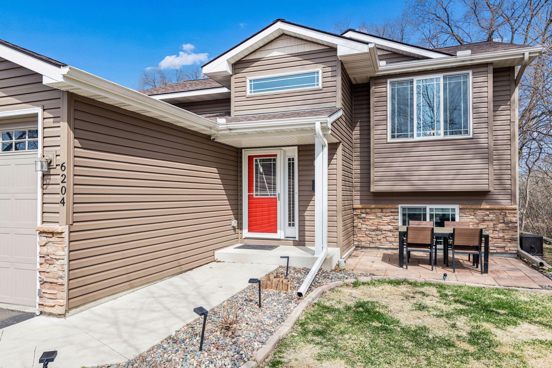 Front entry features sunny patio