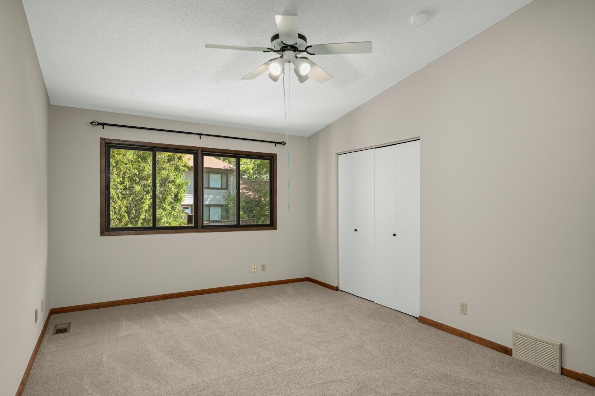 Large primary with vaulted ceiling and large closet