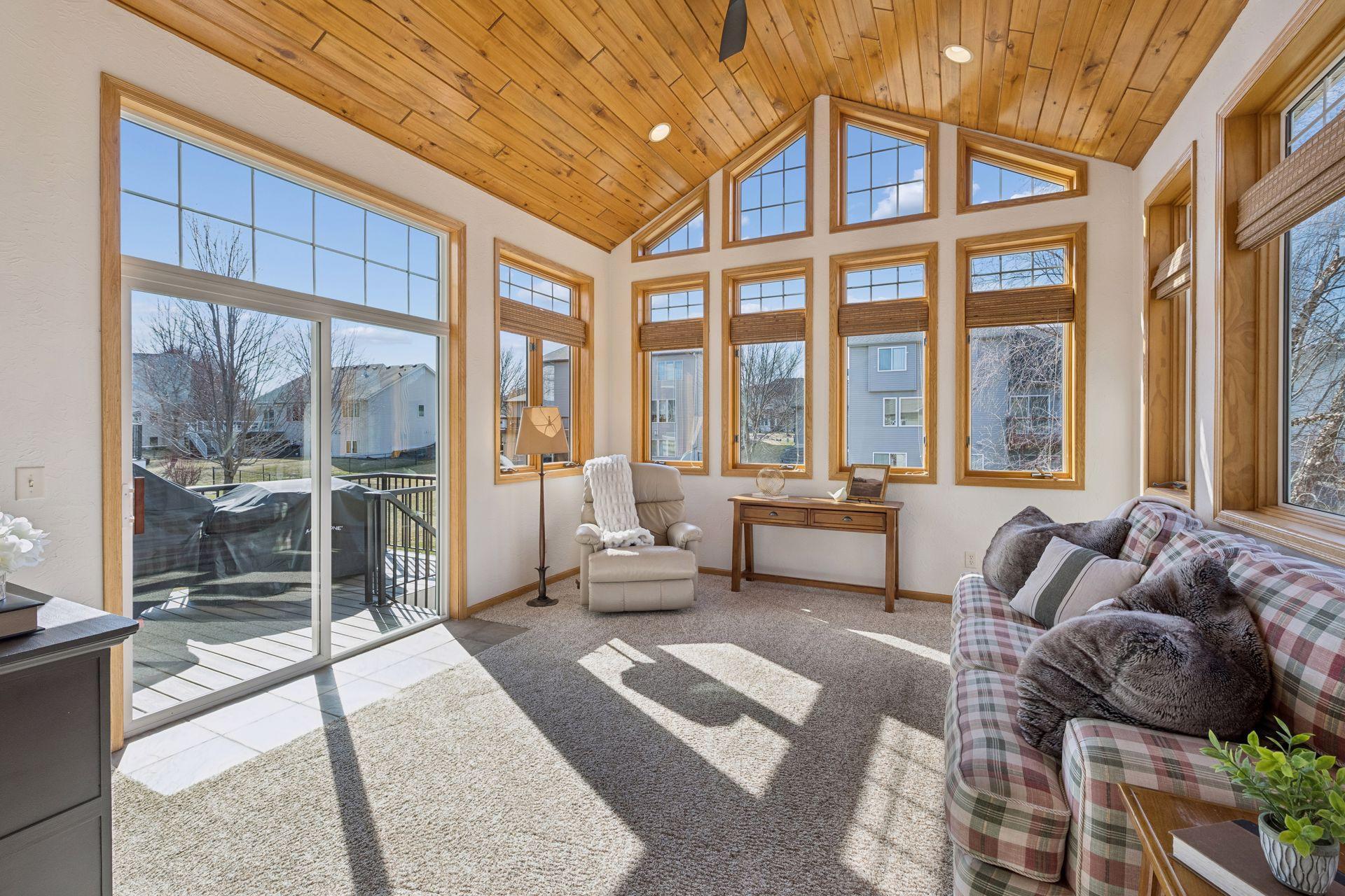 4 season porch wrapped in windows