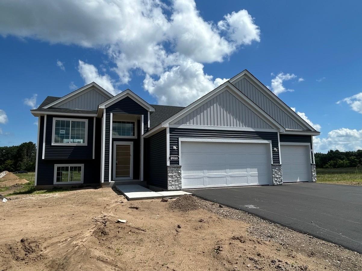 Photo taken of another home with similar exterior color package. Photos and renderings may not depict actual plan, materials, & finishes may vary. All measurements are approximate.