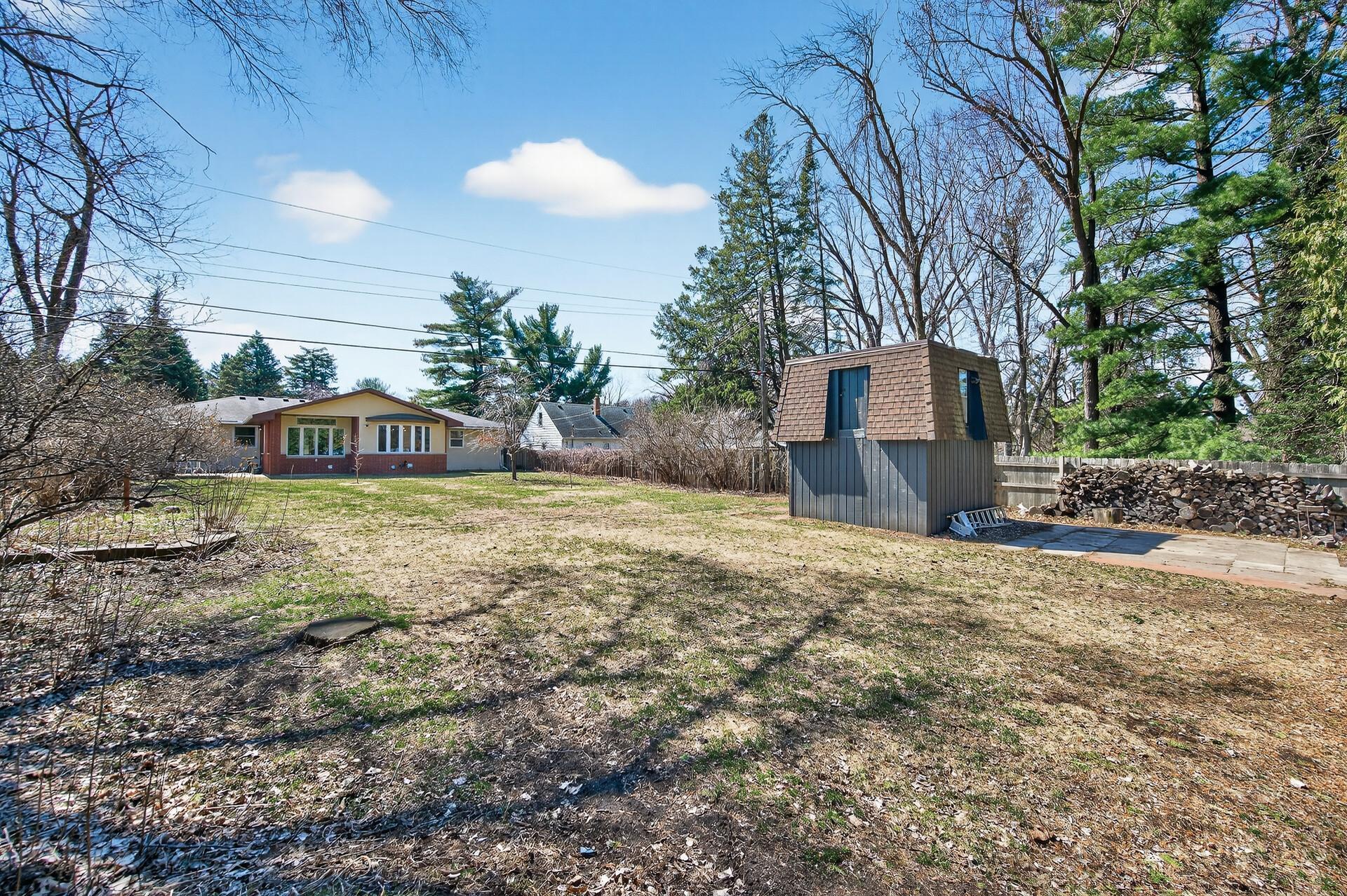 2-Story 13x13 Shed with Power. Concrete Parking Slab.