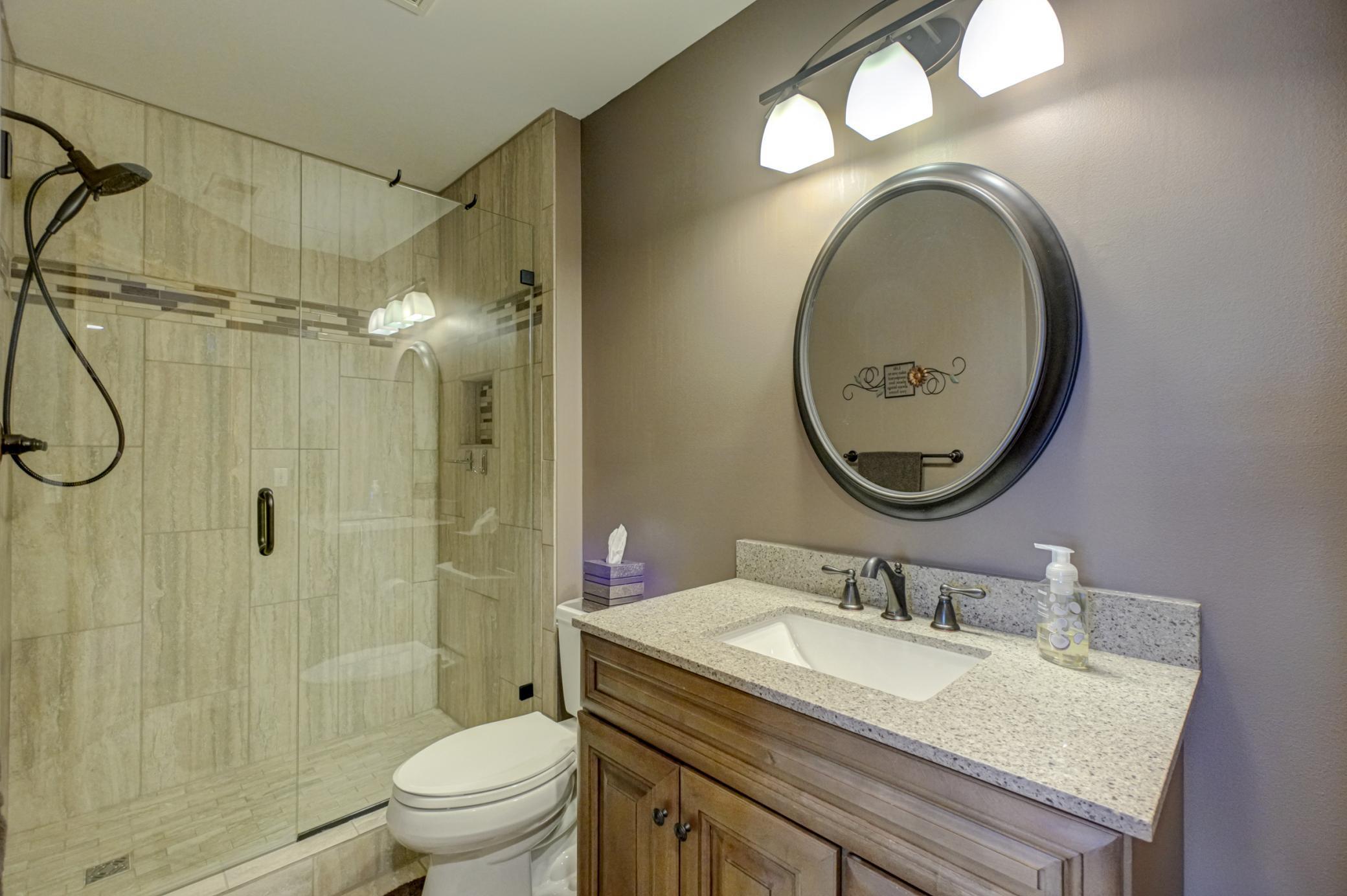 Updated lower-level 3/4 bathroom with a fresh, modern feel