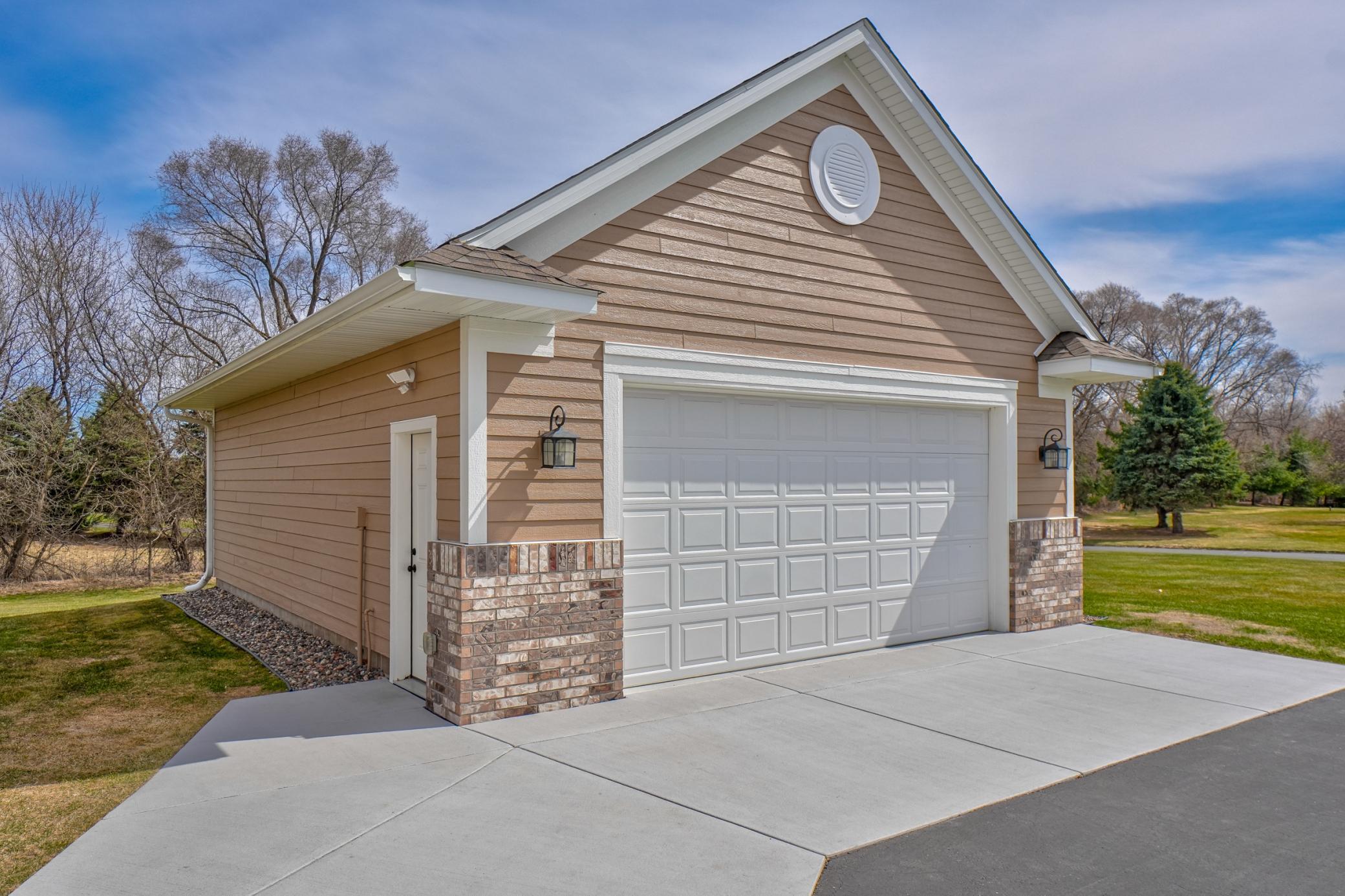 Garage lover’s dream featuring a newer heated 4-stall detached garage with epoxy floors!