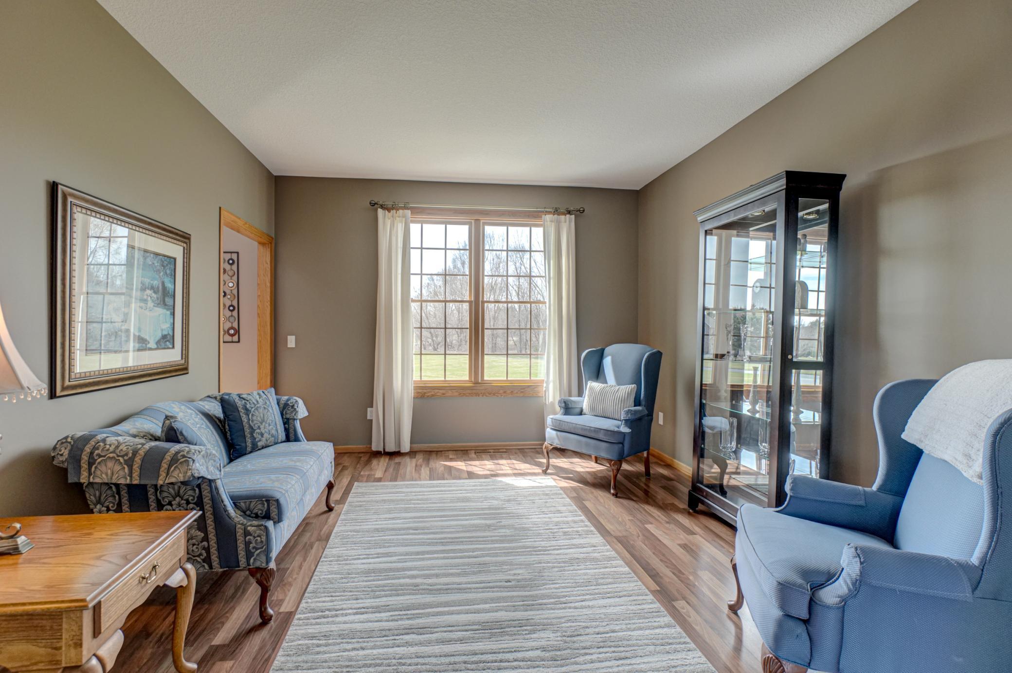 Flexible main-level room to fit your needs—office, sitting room, or playroom