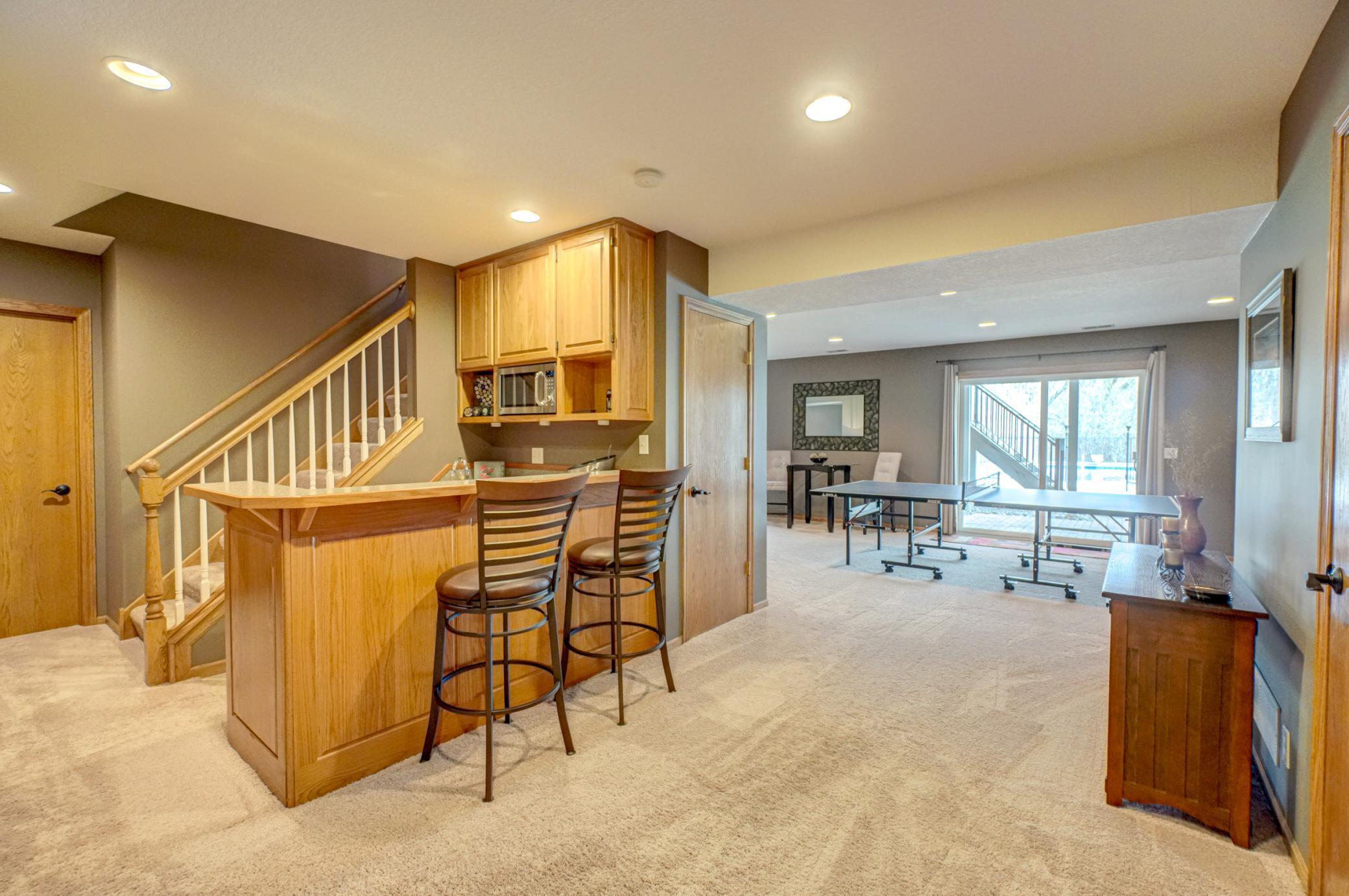 Lower-level wet bar designed for effortless entertaining!
