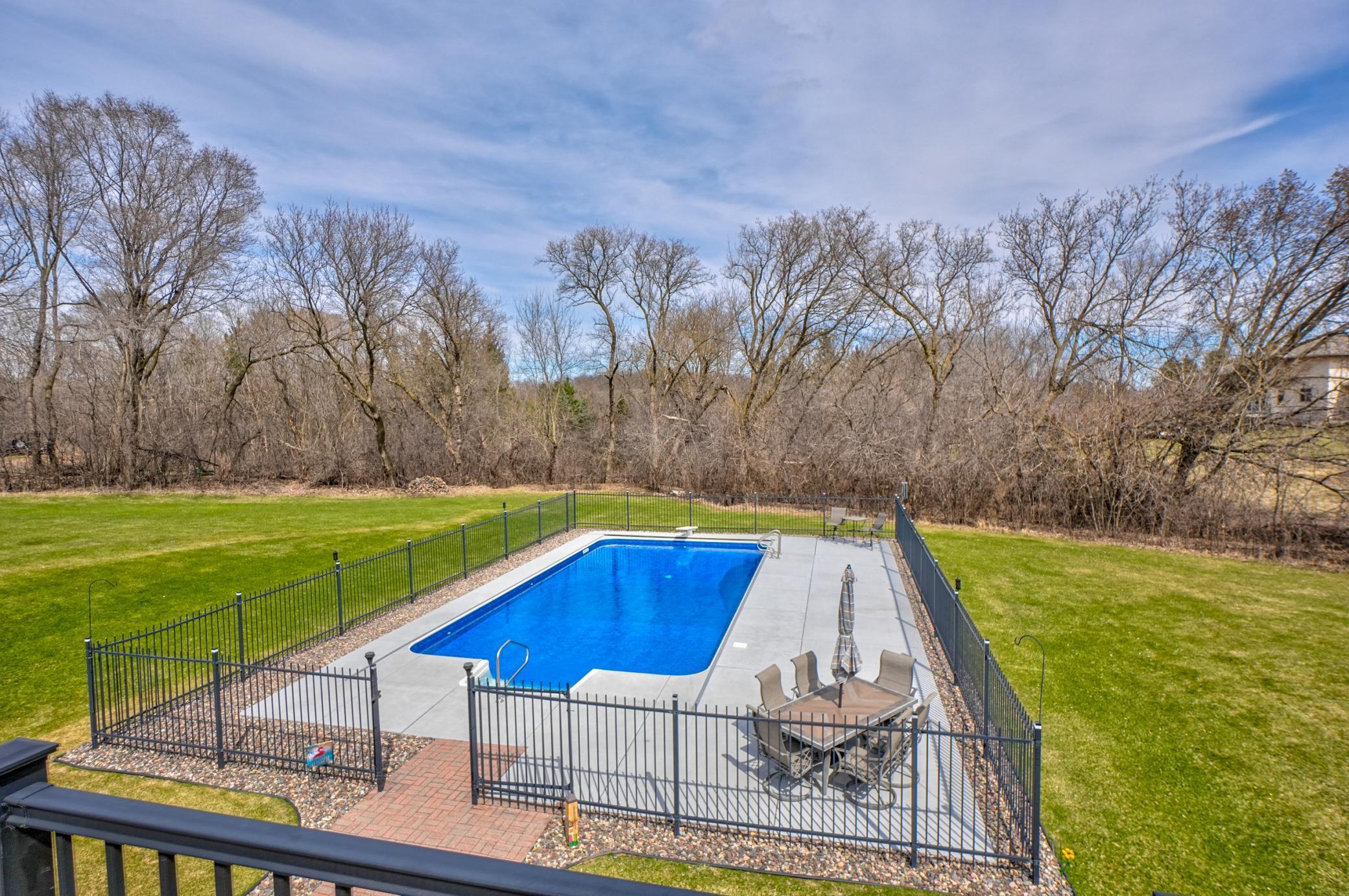 Relax in your heated pool with a new liner and automatic cover!