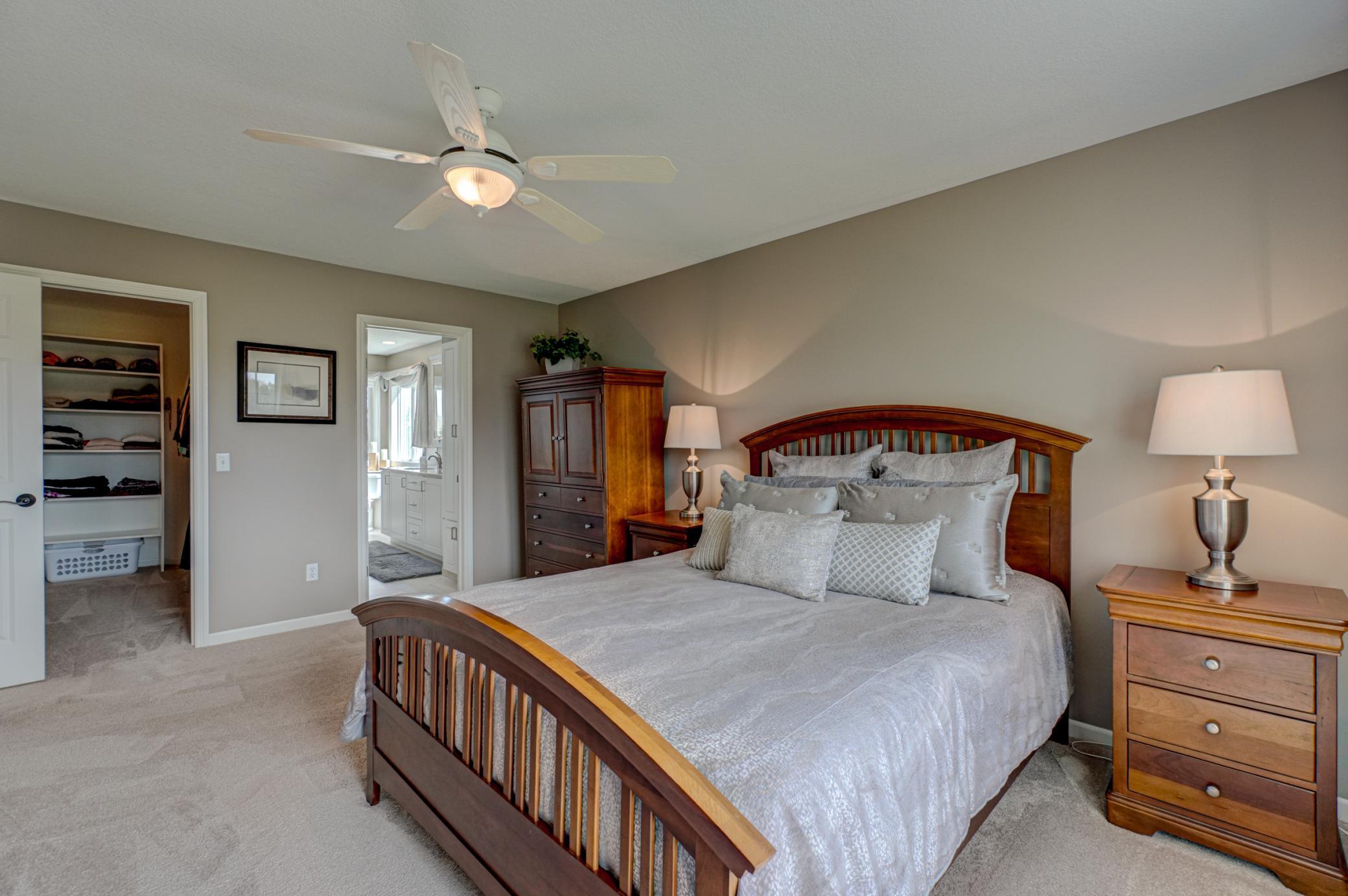 The spacious primary suite features a private bath and large walk-in closet!