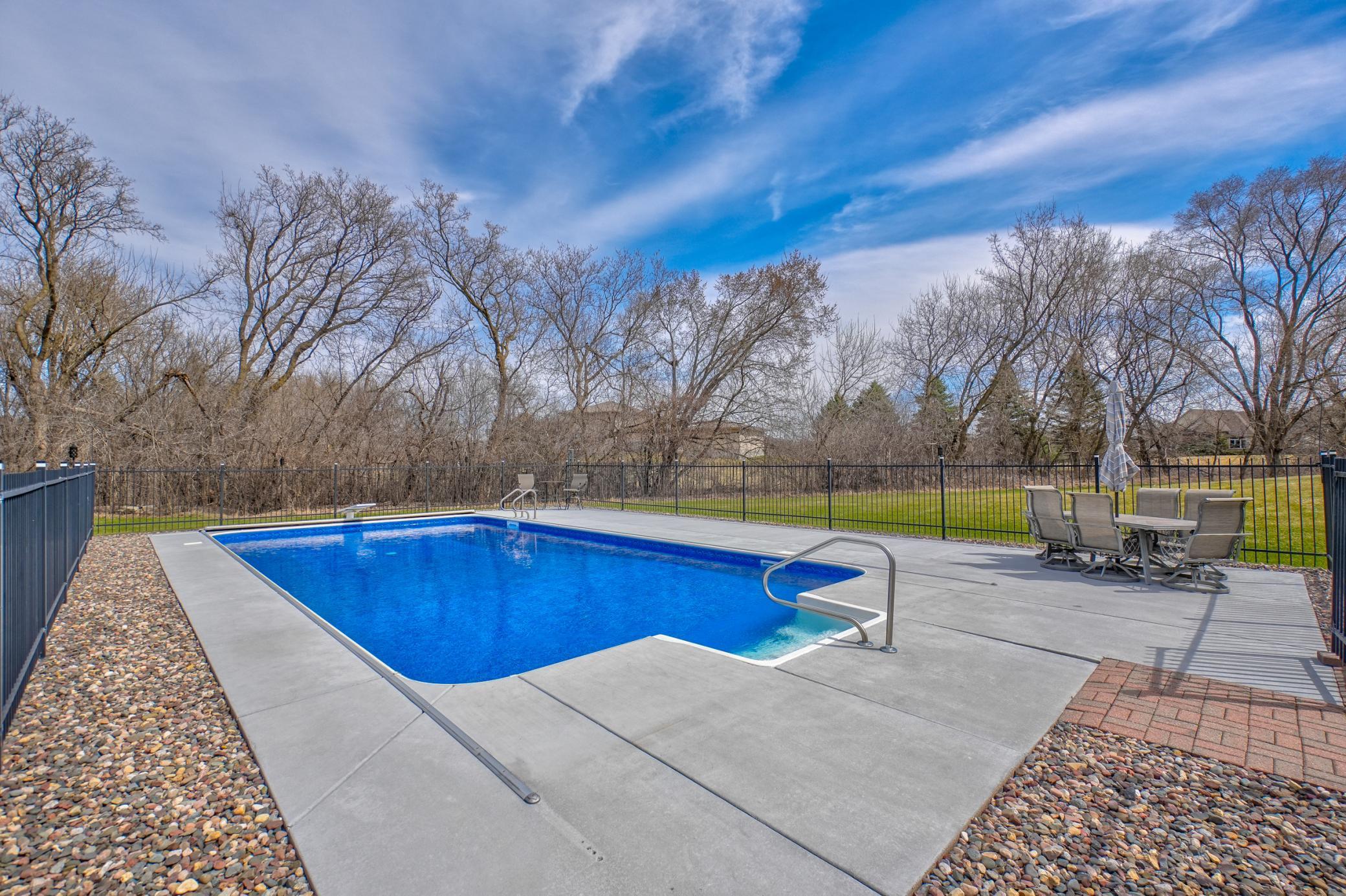 Well-cared-for pool featuring upgraded filter and heater