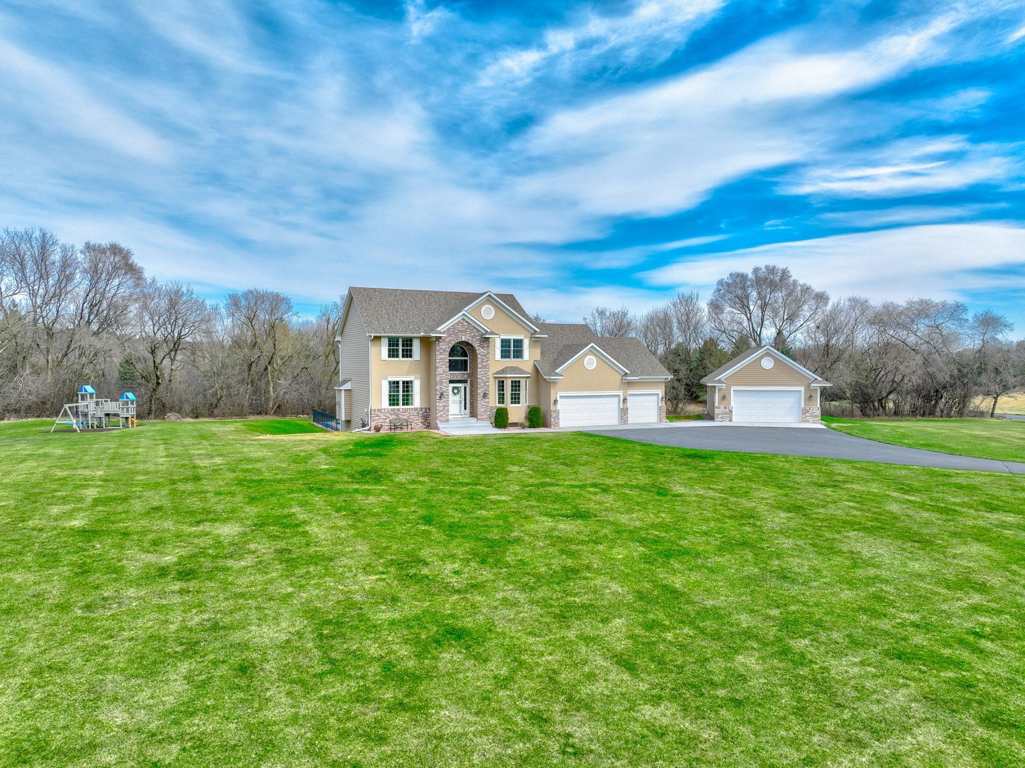 Your private dream oasis awaits—offering the perfect blend of privacy, entertaining spaces, and an incredible garage setup!