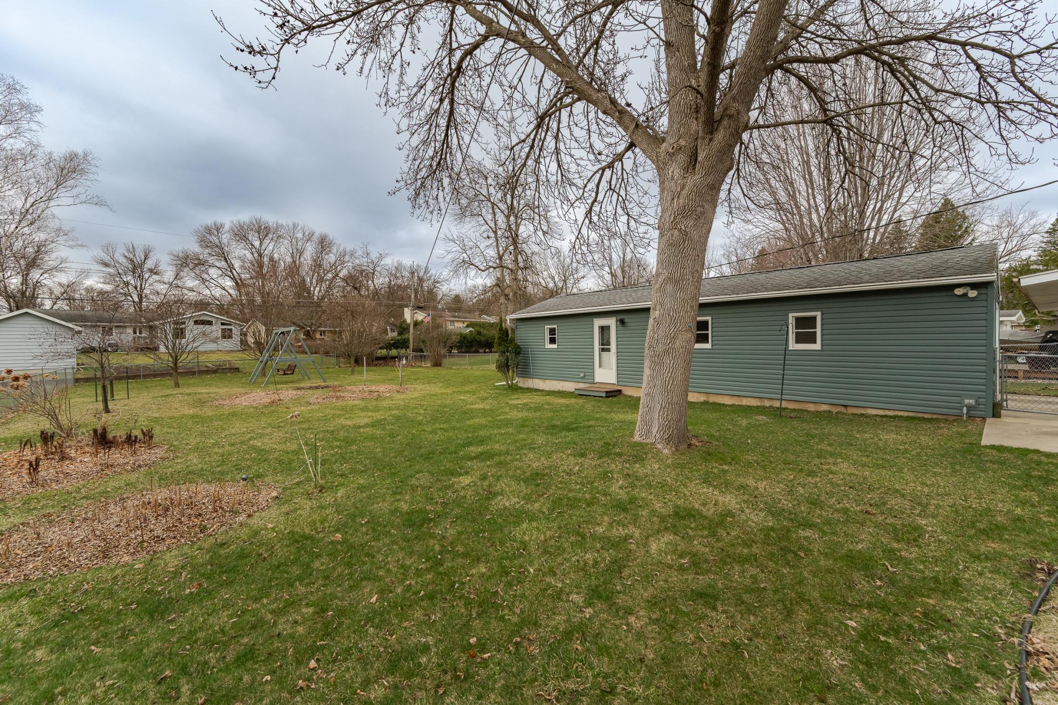 Backyard and 2 car tandem garage