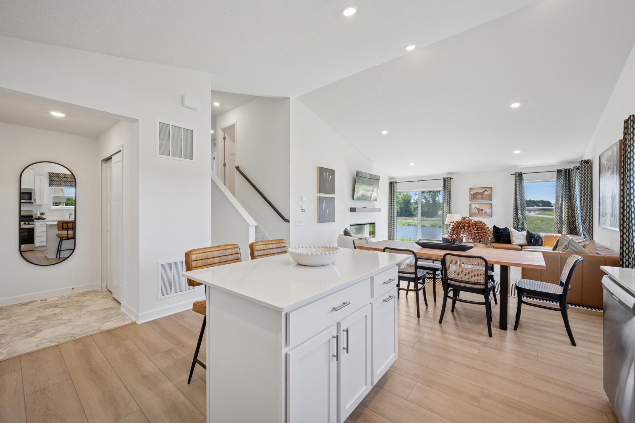 (Photo of a model home, finishes will vary) The center island adds additional meal preparation space, and the pull-up seating makes it easy to entertain while cooking.
