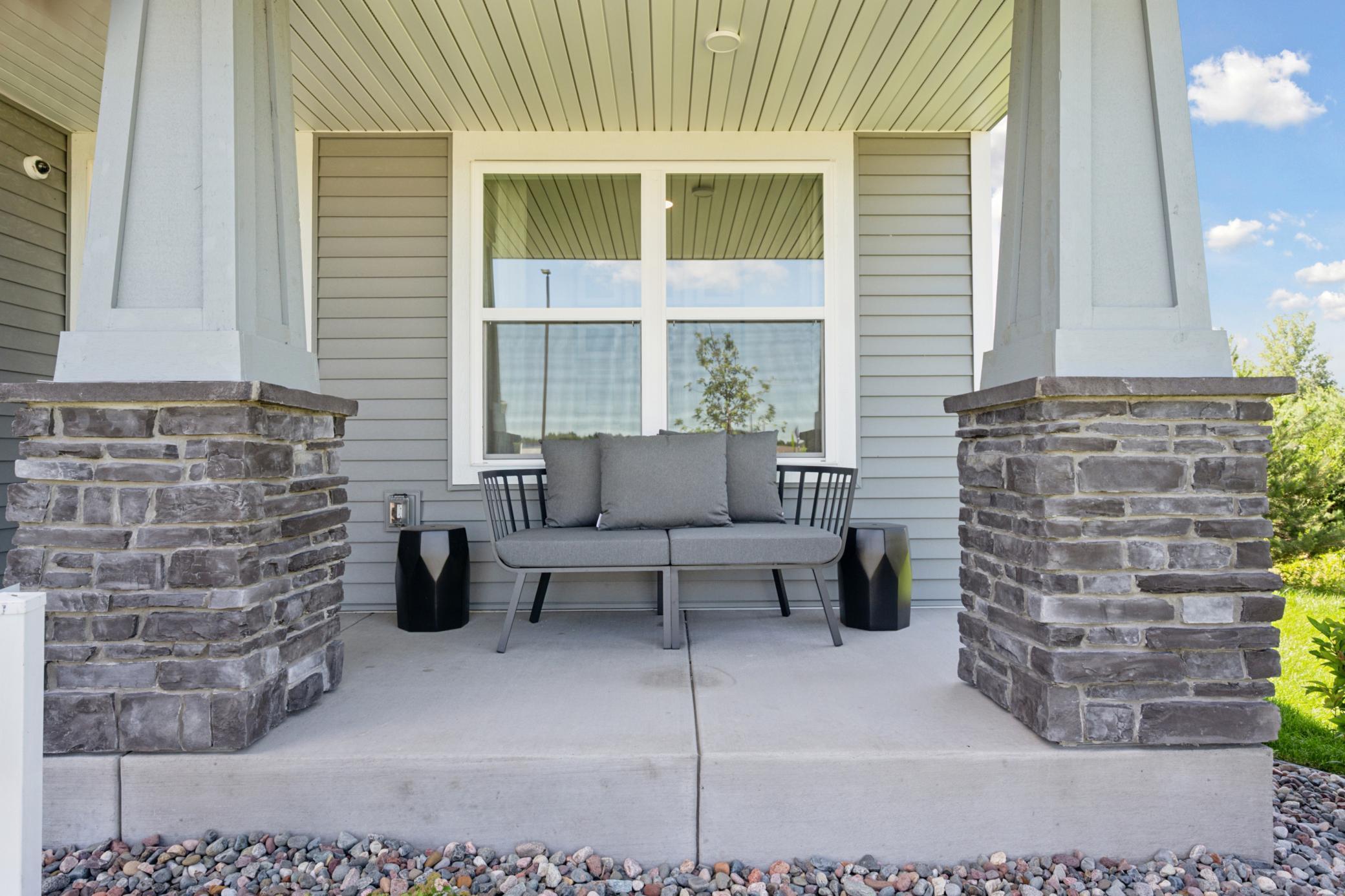 (Photo of a model home, finishes will vary) The front porch.