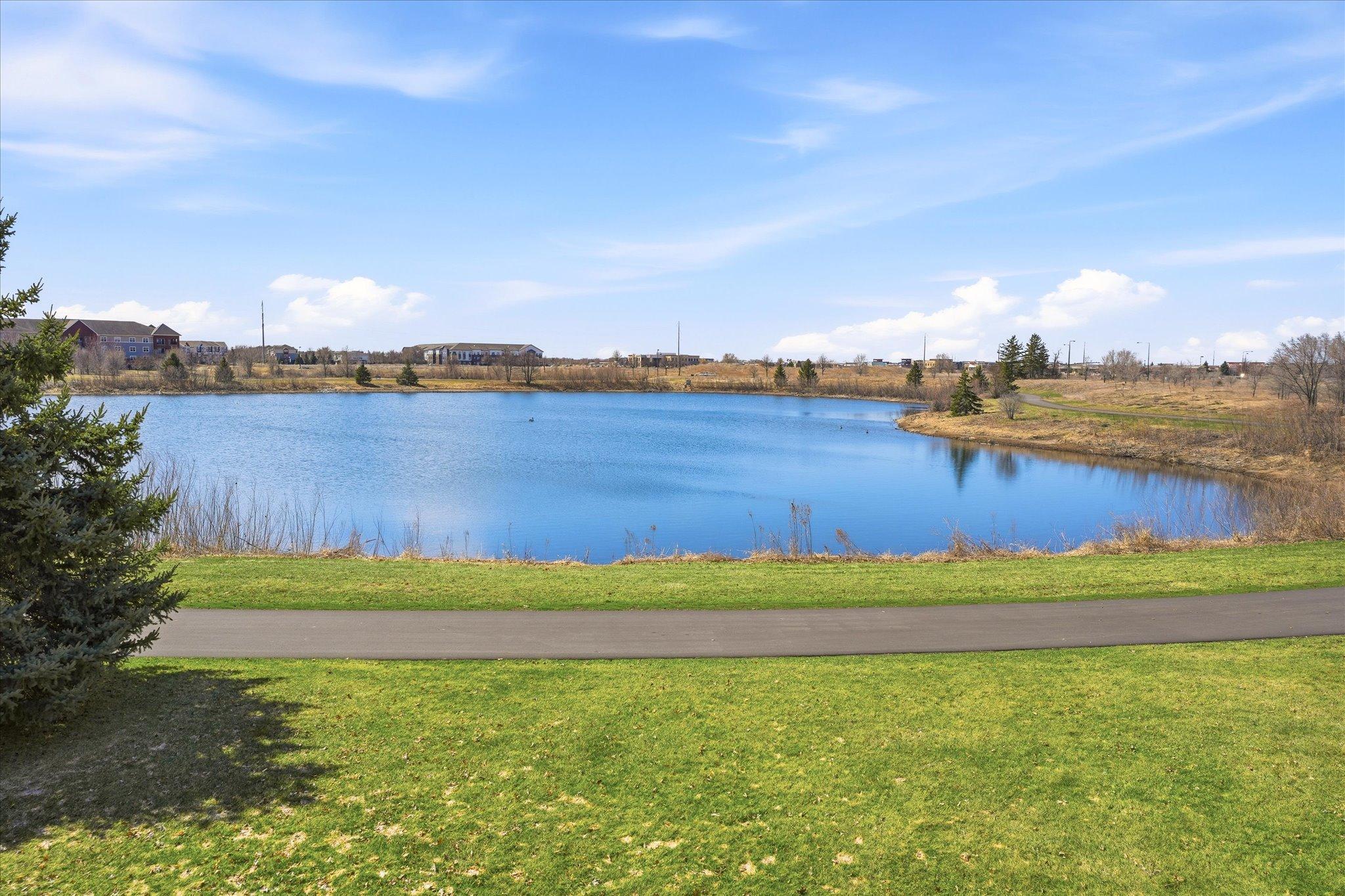 Your view from your back yard. Beautiful pond views and trails to explore