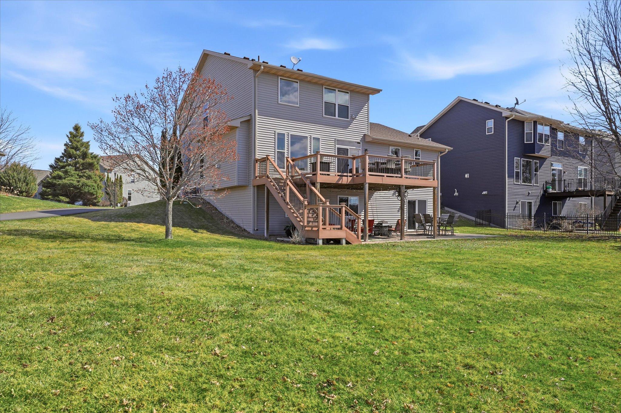 Beautiful level backyard is great for kids and pets to roam. Nice green backyard thanks to your own irrigation system