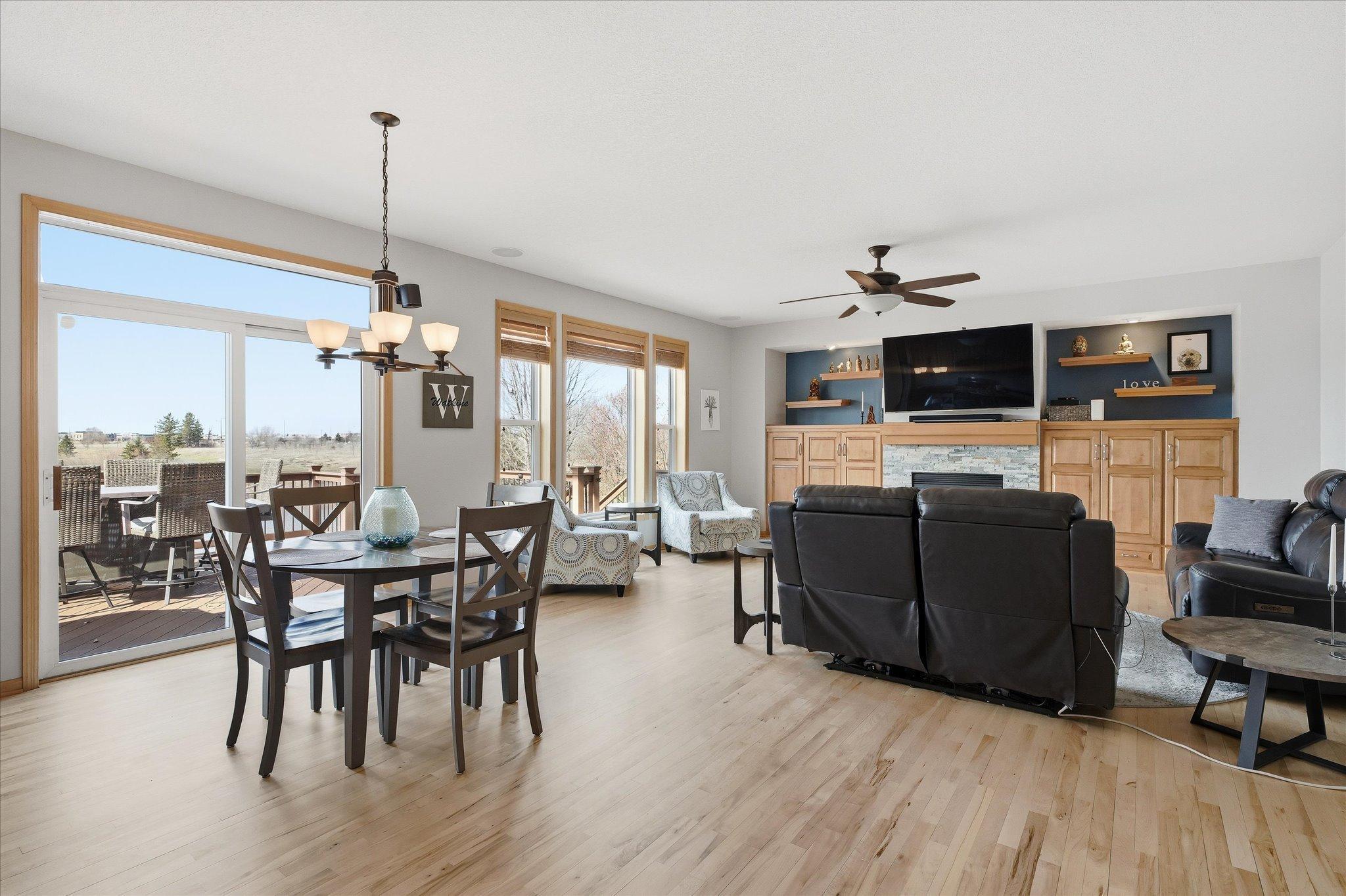 Open main Floor Family and Dining Rooms with refinished maple hardwood floors
