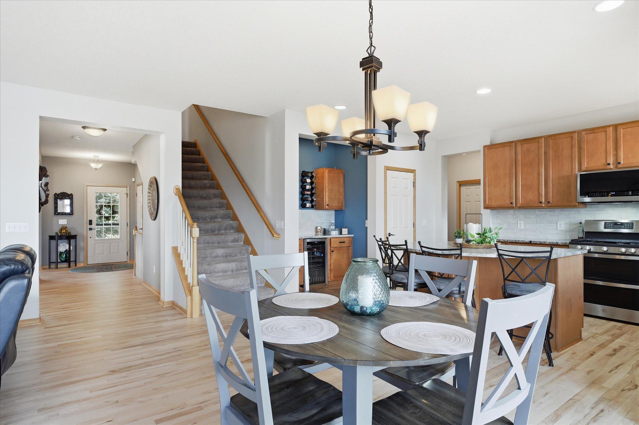 Open Kitchen and Informal Dining room with maple hardwood floors