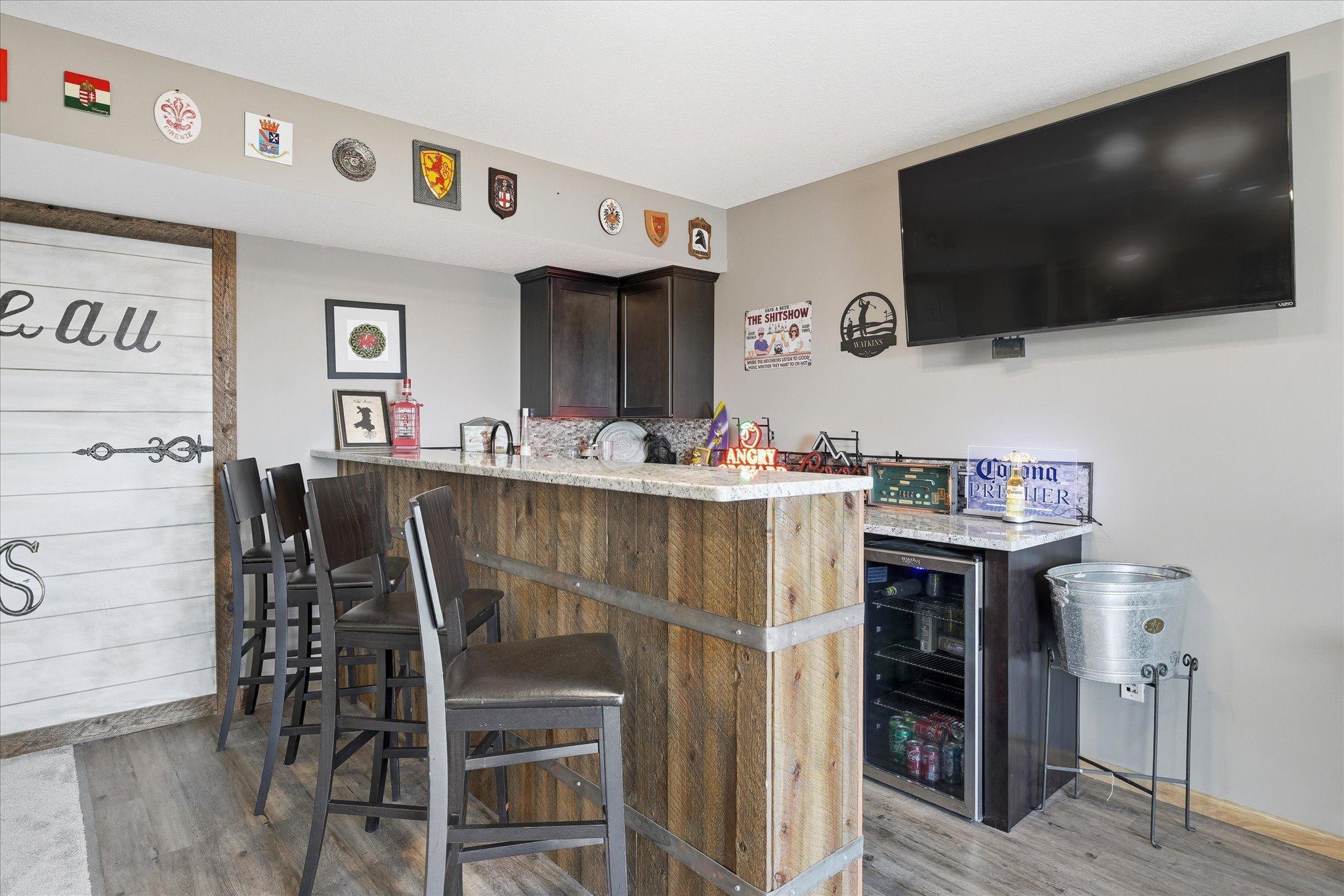 Custom wet bar with granite counter top