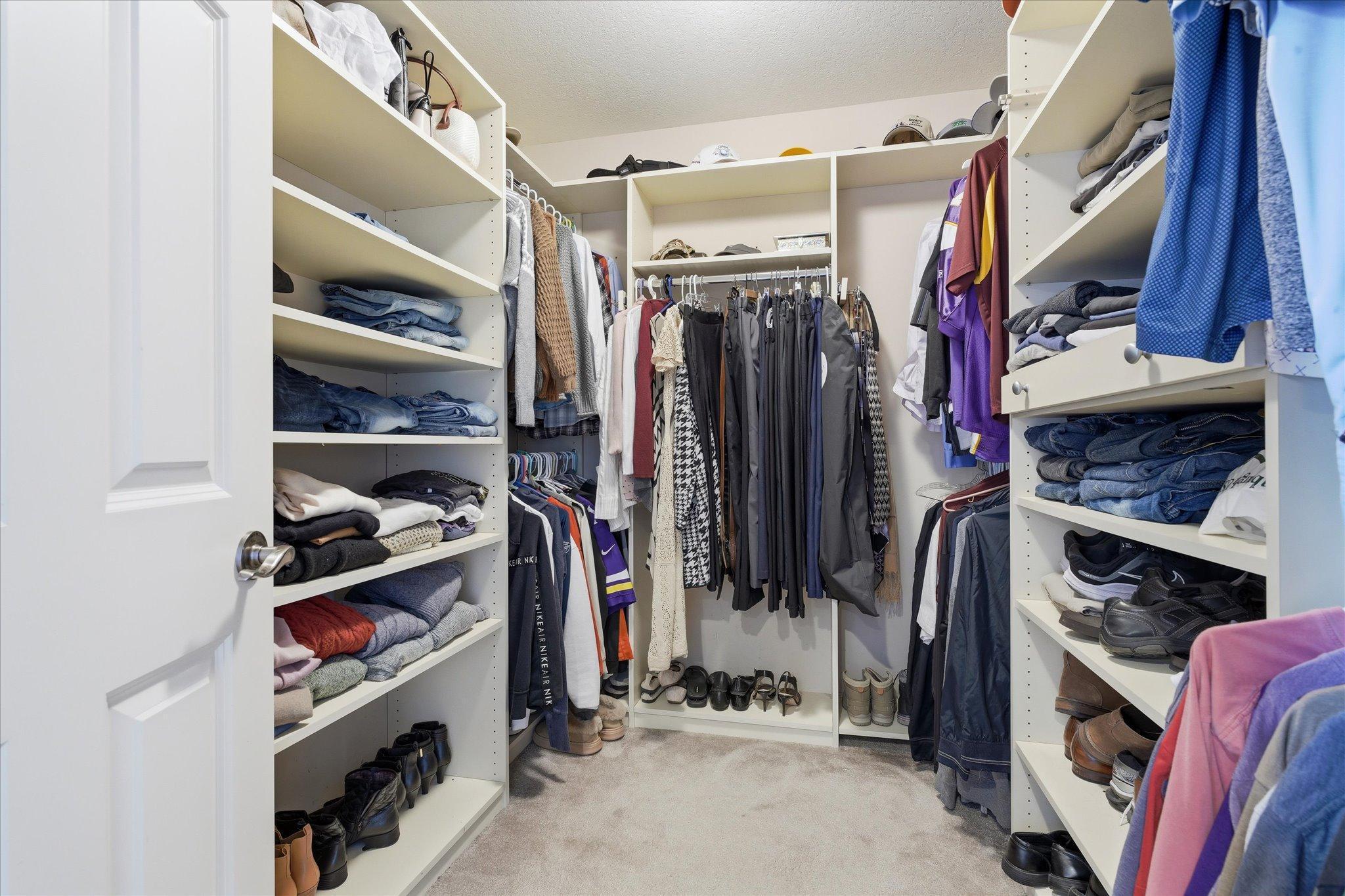Primary Bedroom walk-in closet