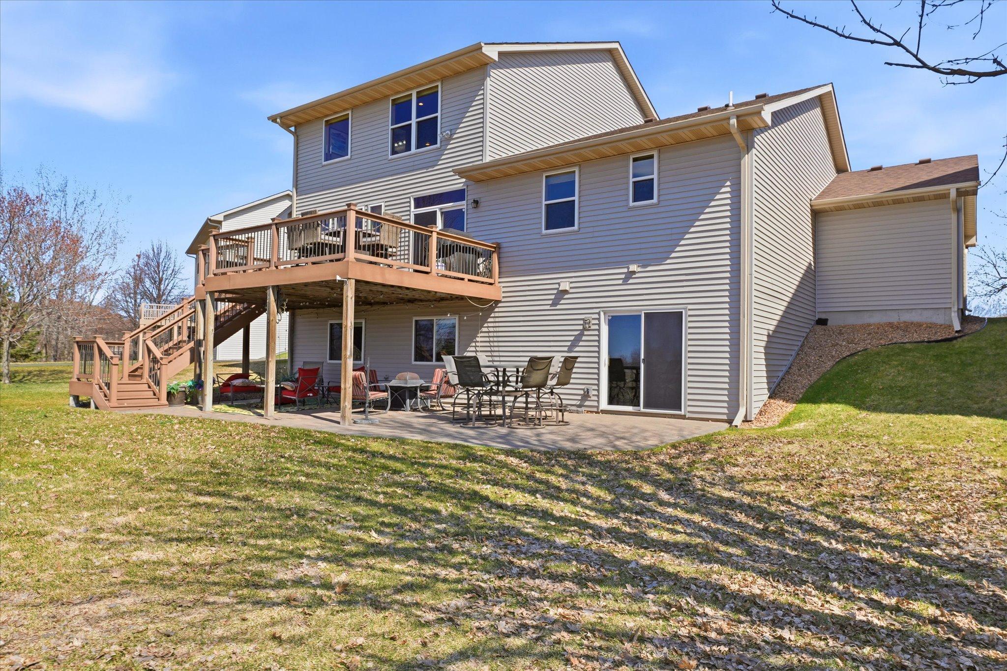 Sun-filled Southwest exposure back patio and composite deck for great sunsets and entertaining