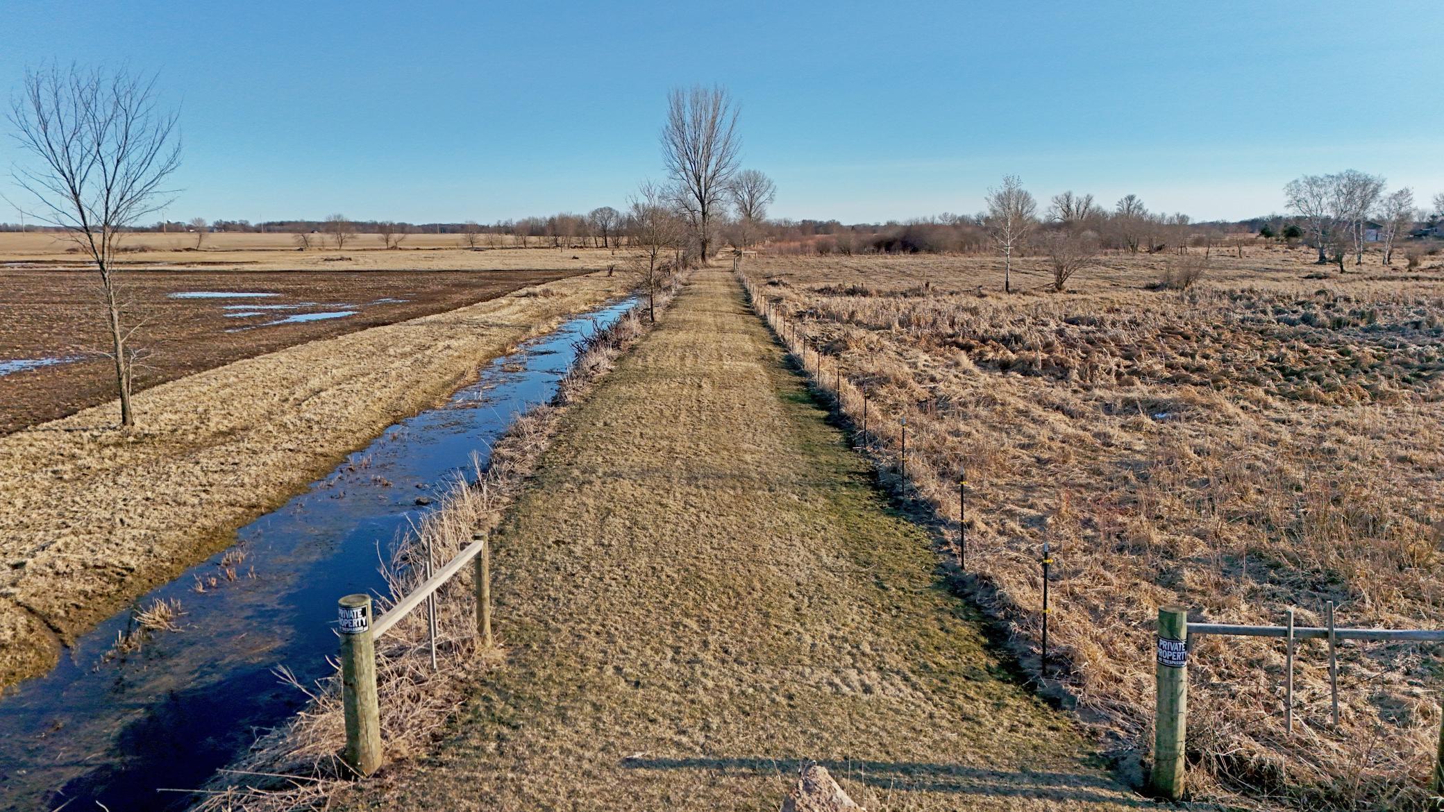 County drainage ditch and driveway access into subject parcel off 125th Street NE
