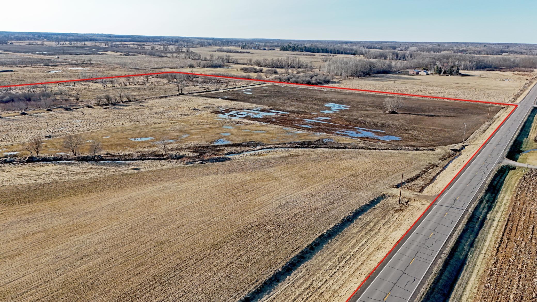 View of subject property from SE looking NW. CR #9 along east boundary is shown.