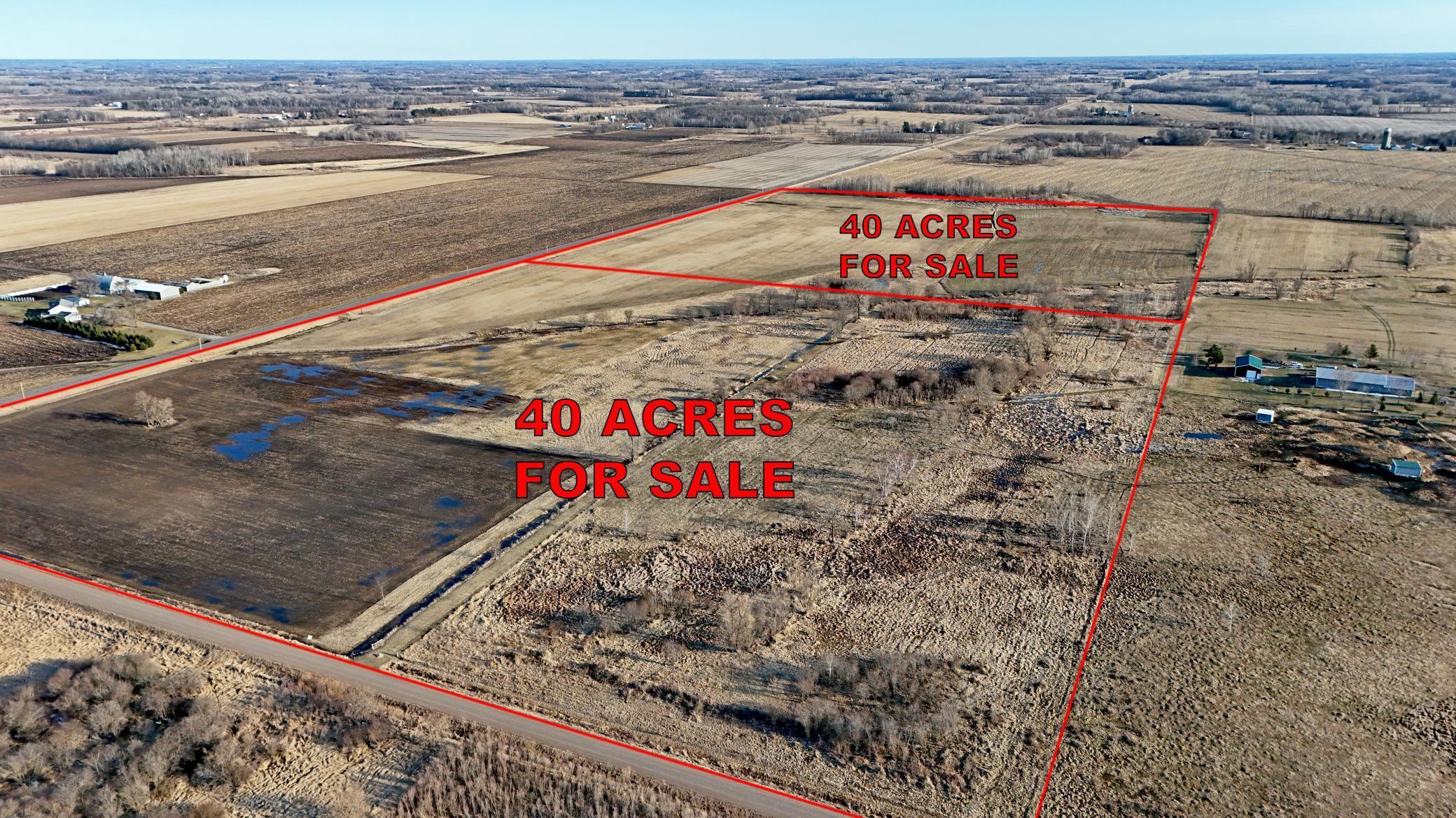 Subject property is the foreground of this photo with CR #9 serving as the east boundary and 125th Street NE as the north. Additional acreage is shown in the background (south of subject property) MLS #7050335