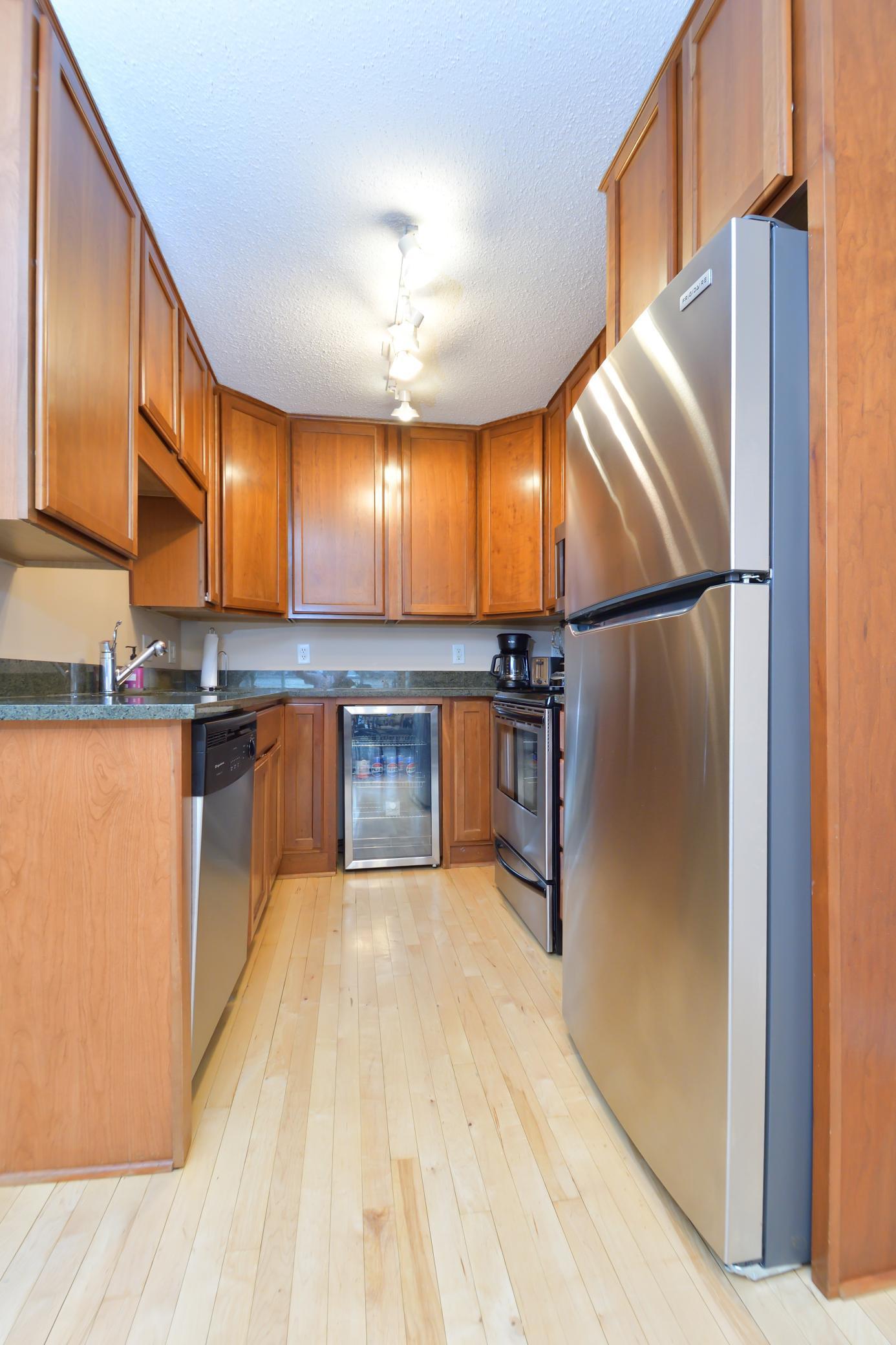 Updated kitchen featuring stainless steel appliances