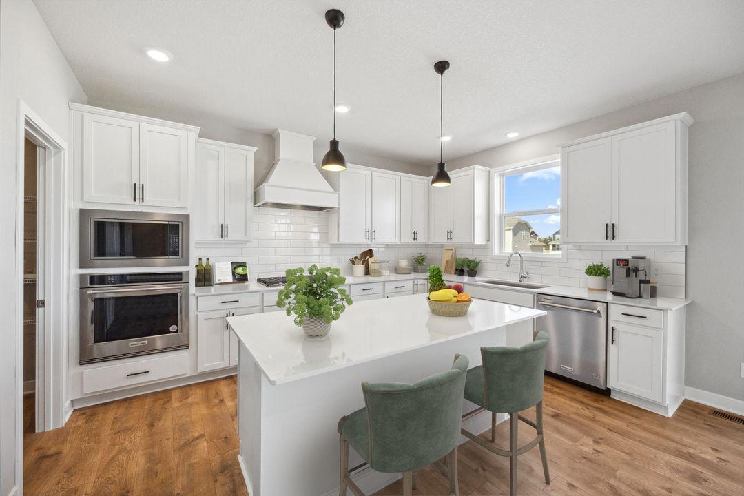 The upgraded Gourmet kitchen will certainly please the family chef! Model photo, options and colors may vary.