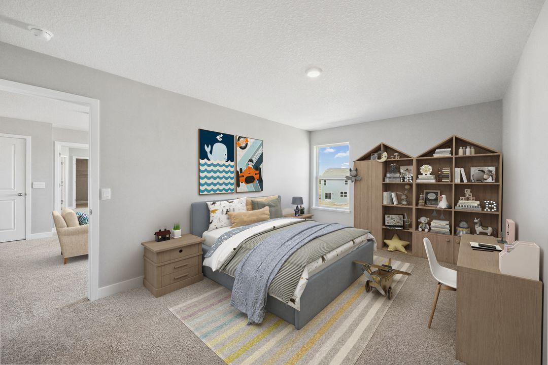 The second primary bedroom has plenty of space to spread out! Model photo, options and colors may vary.