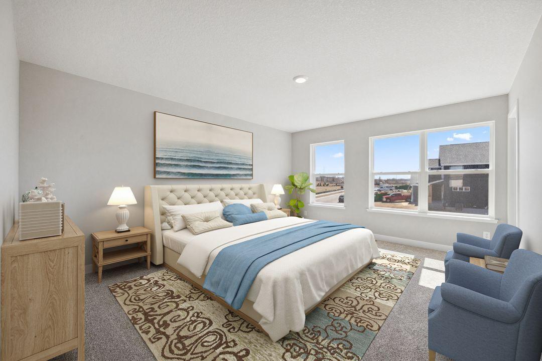 One of four upstairs bedroom - this one with a walk-in closet. Model photo, options and colors may vary.