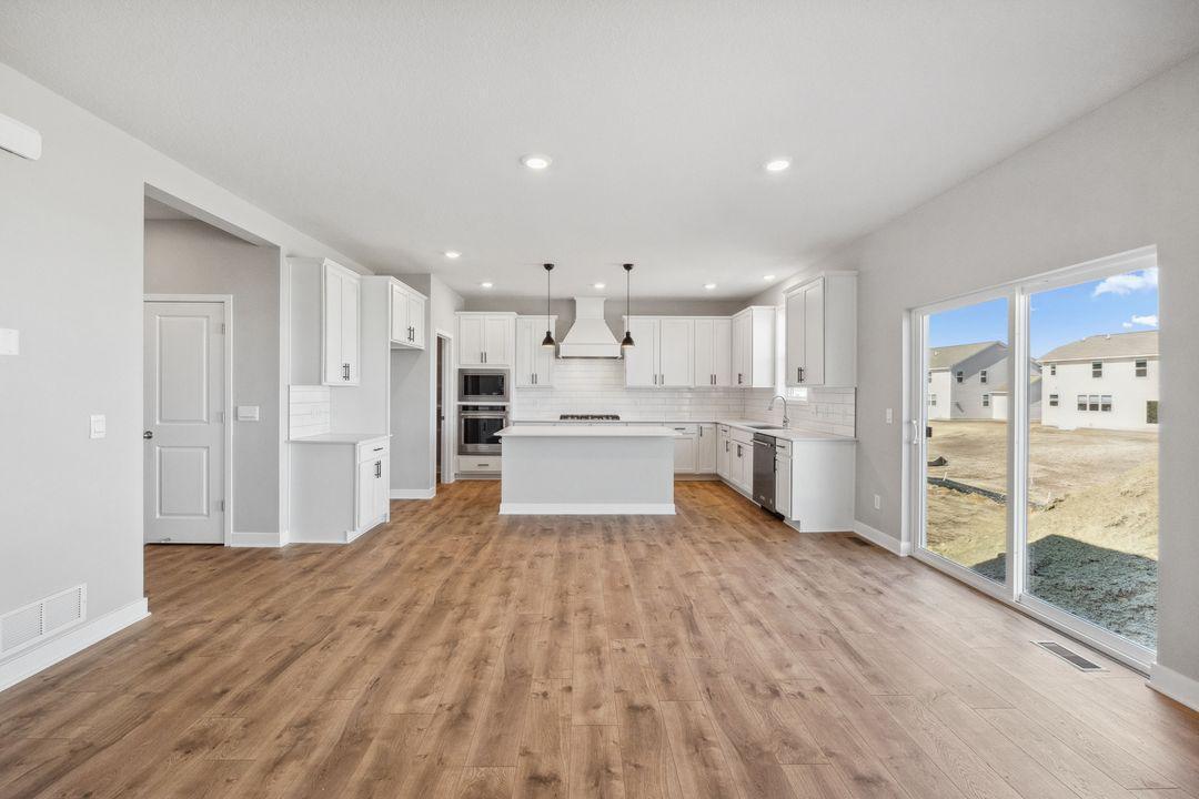 The White cabinet package keeps your space light and bright - lots of windows don't hurt either! Model photo, options and colors may vary.