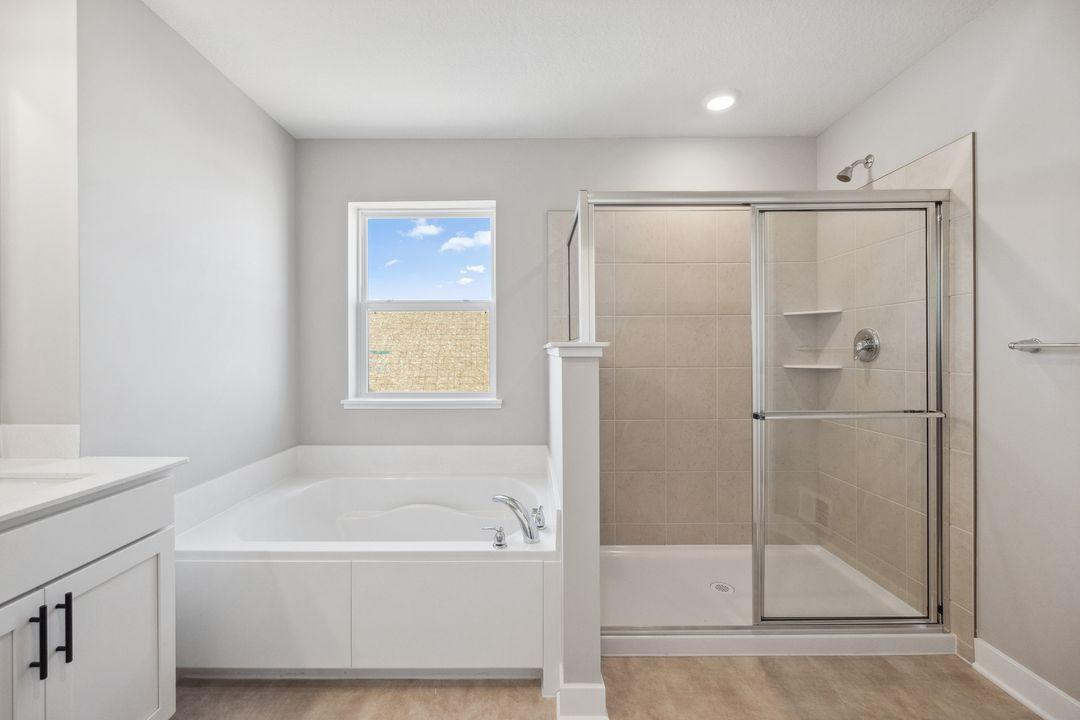 Soak or shower...no wrong answers! Model photo, options and colors may vary.