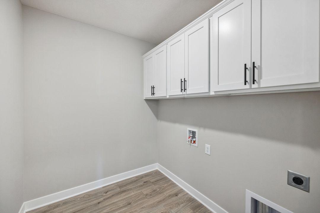 Laundry room upstairs. Making chores feel less like chores! Model photo, options and colors may vary.