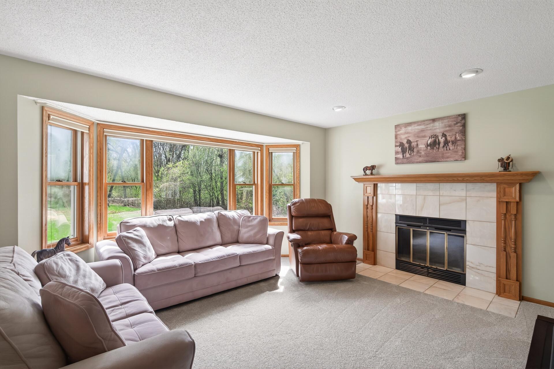 Large picture window overlooking backyard