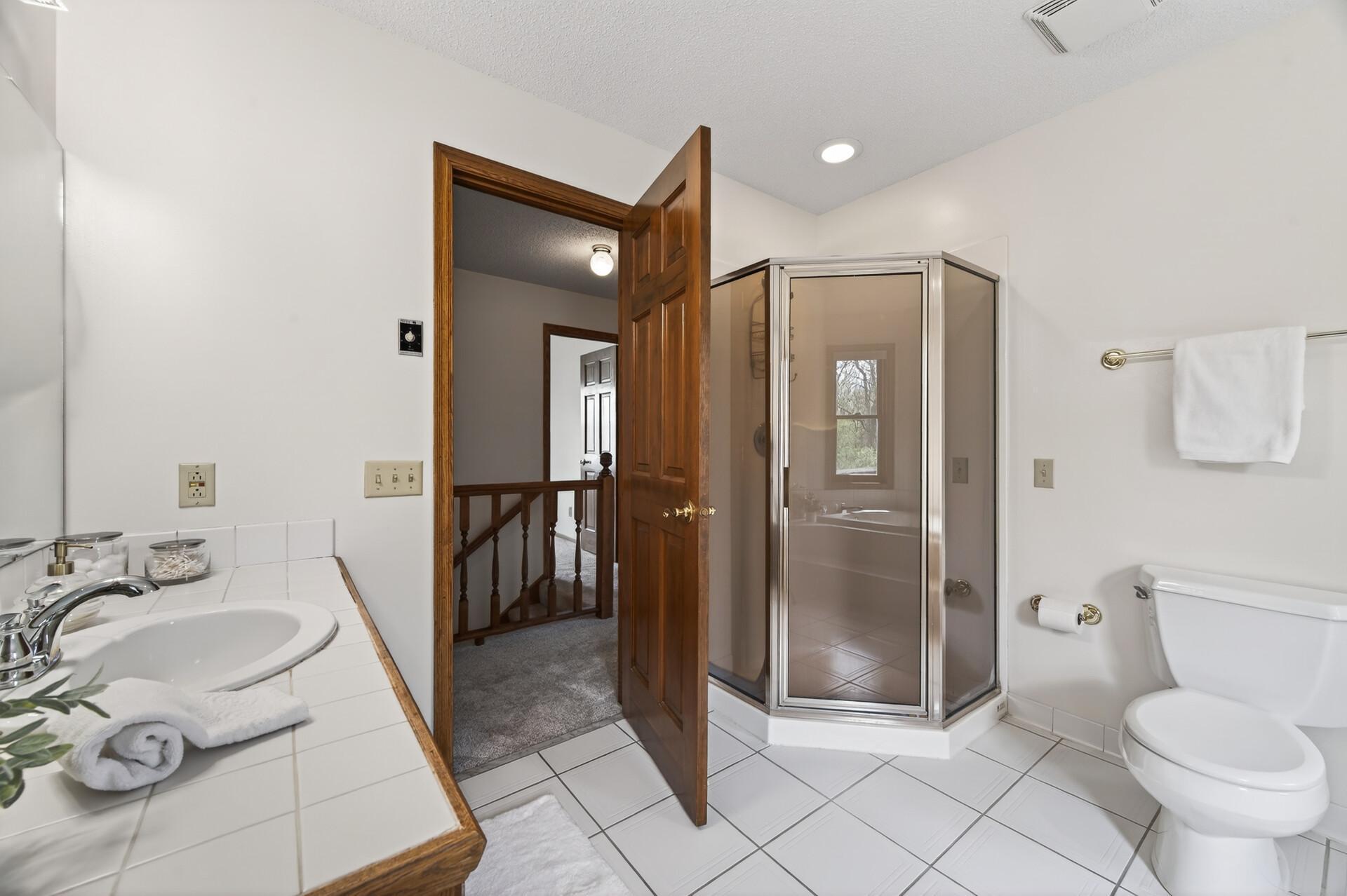 Upper level main bath with separate shower