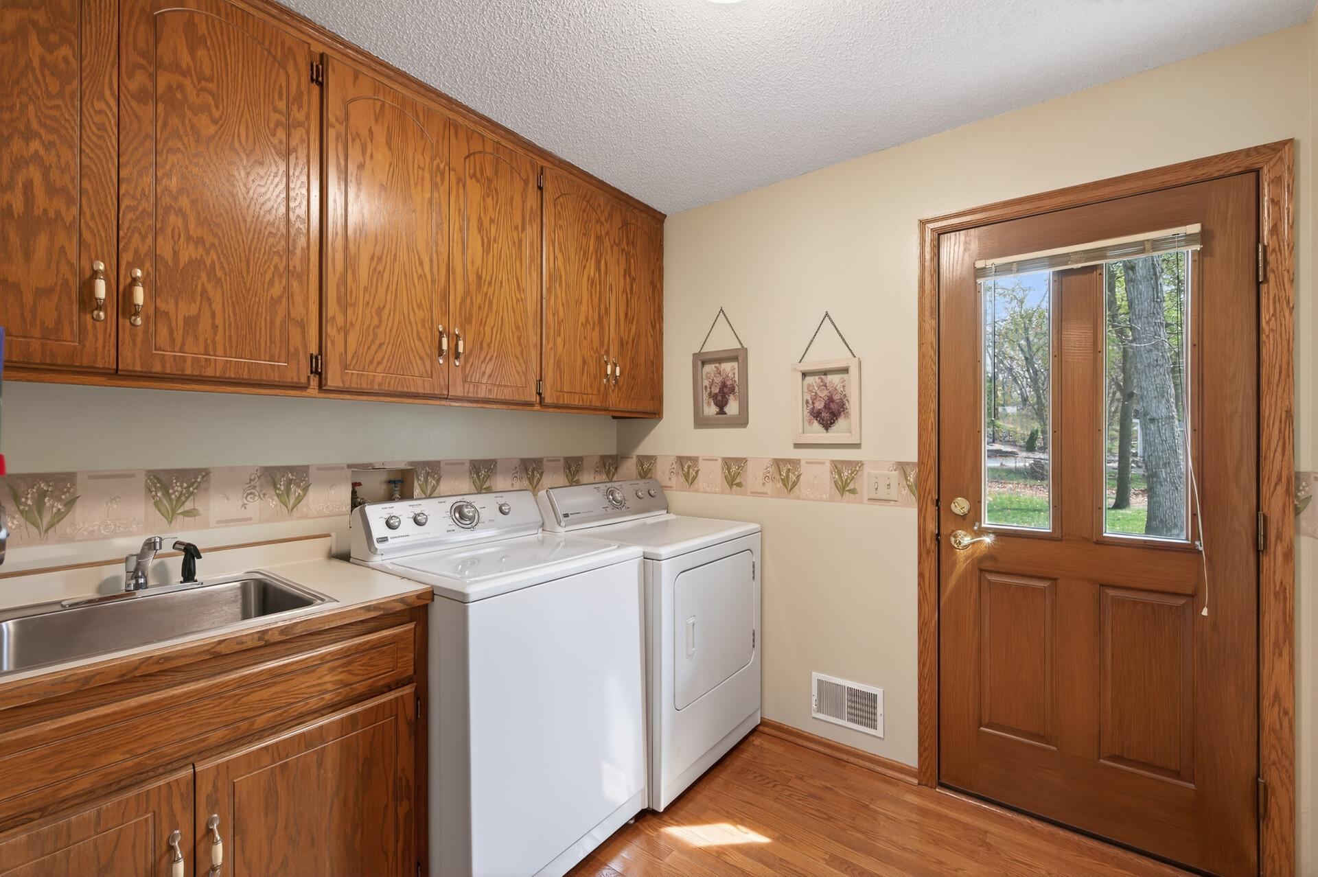 Main level laundry w/access to patio