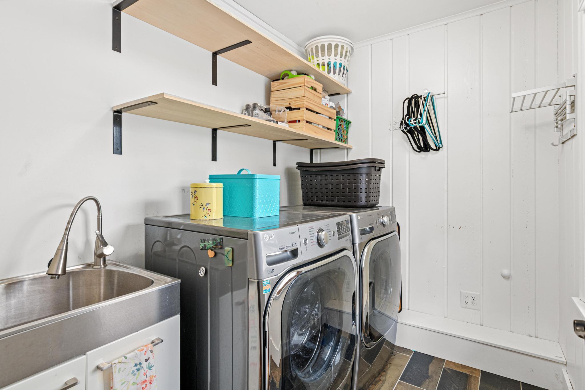Main floor laundry located near entance to the home