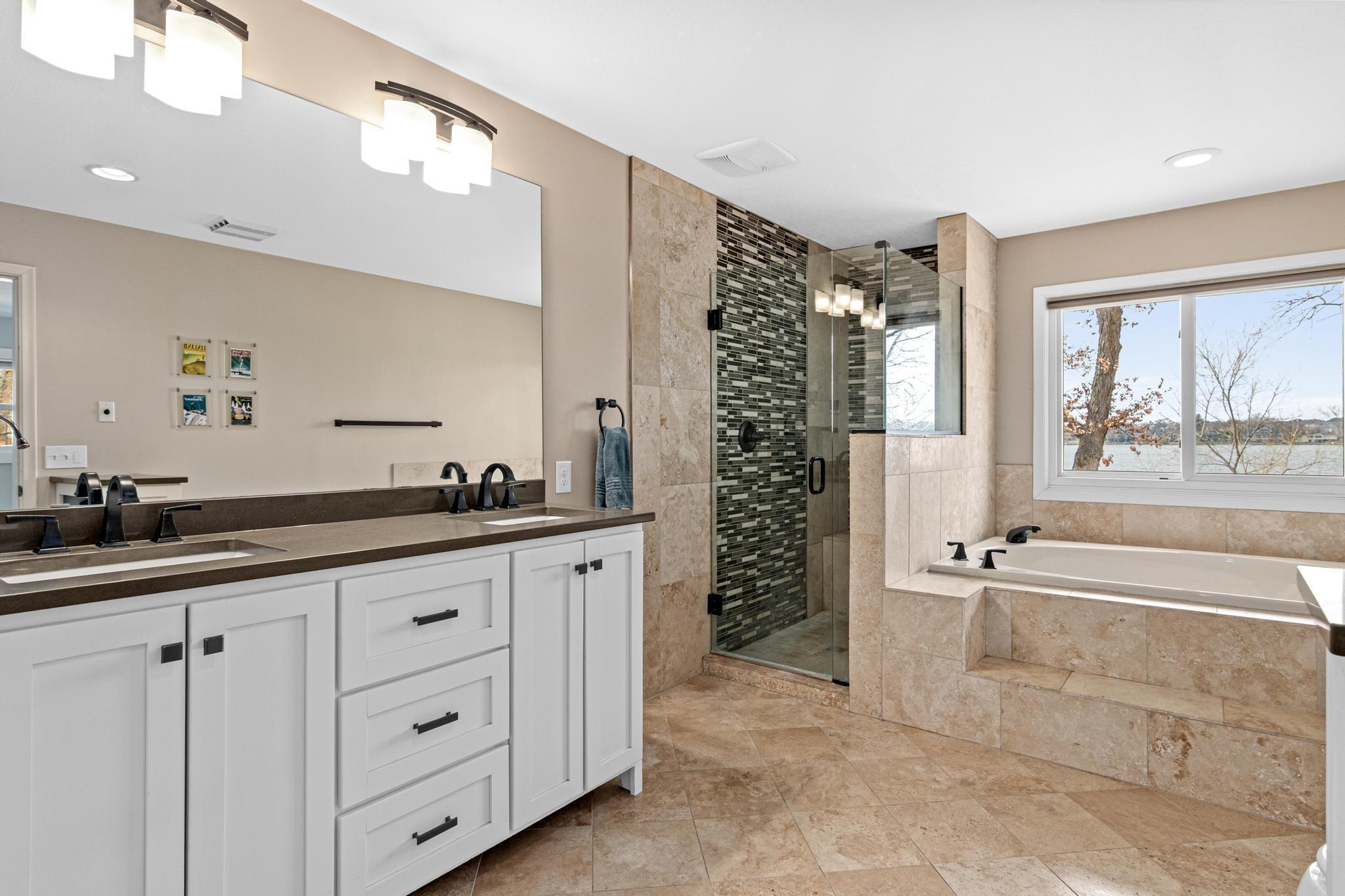 Primary bath with separate tub and shower