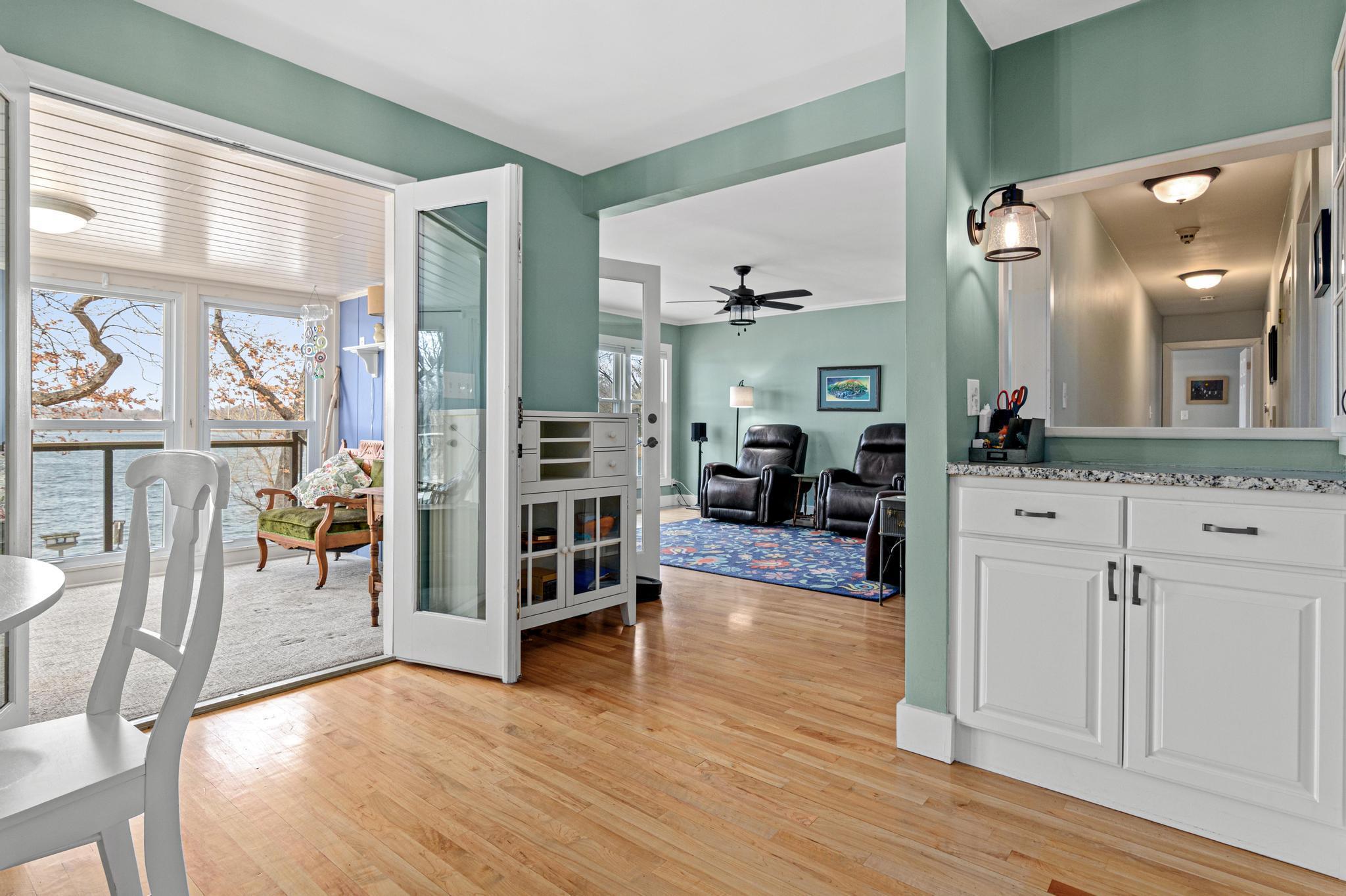 Informal dining area with access to 3 season porch and main floor family room