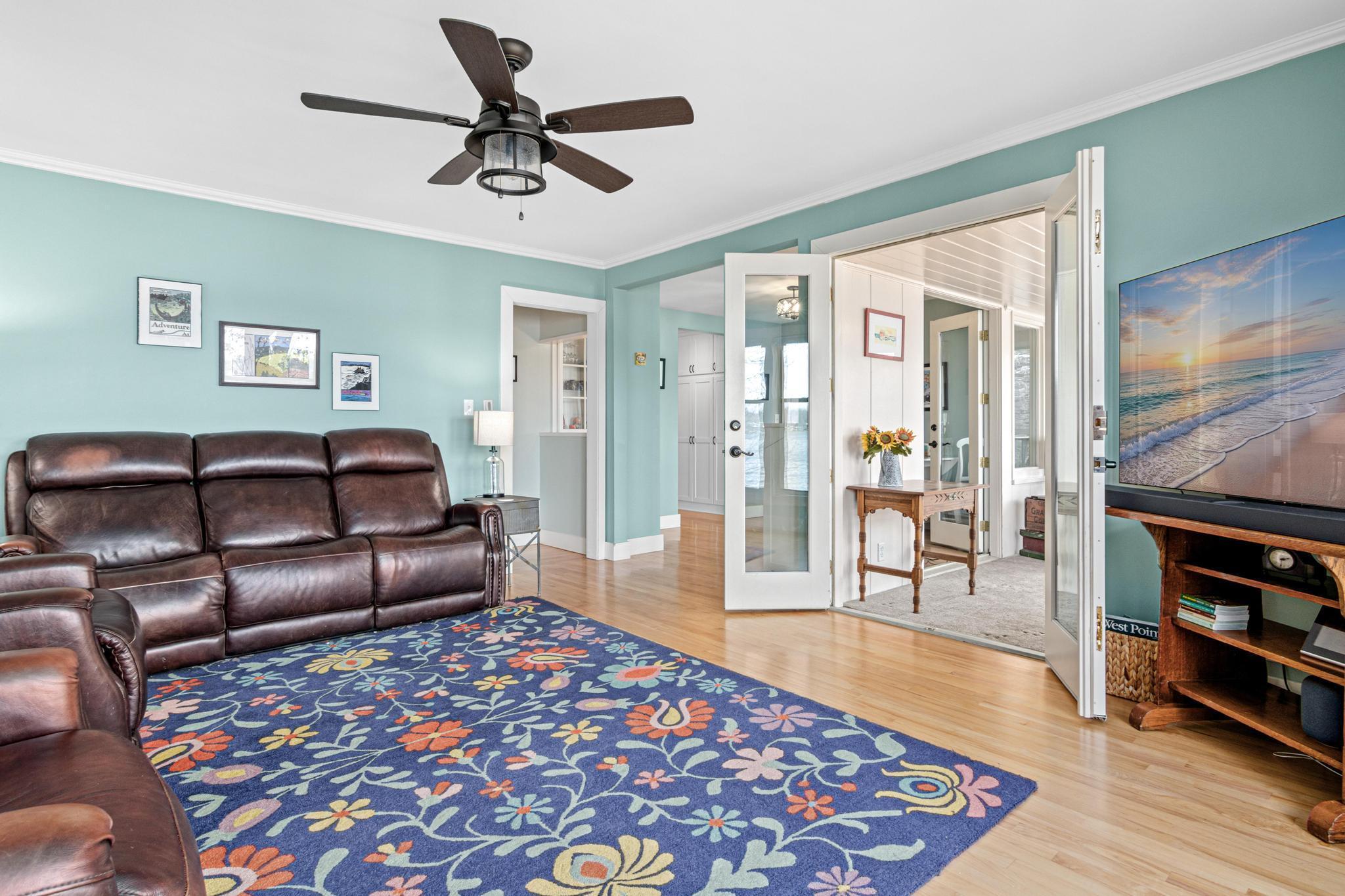 Family room opening to the 3 season porch