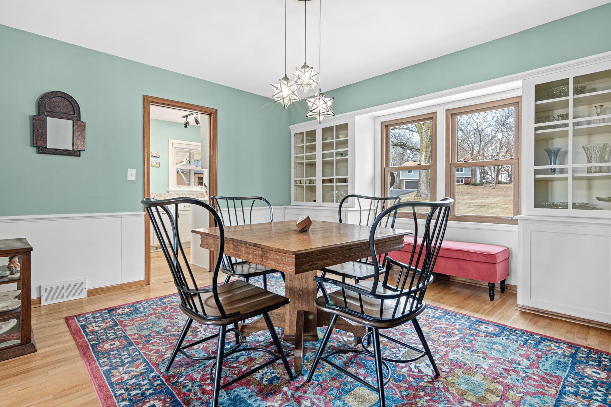Formal dining with entrance to kitchen