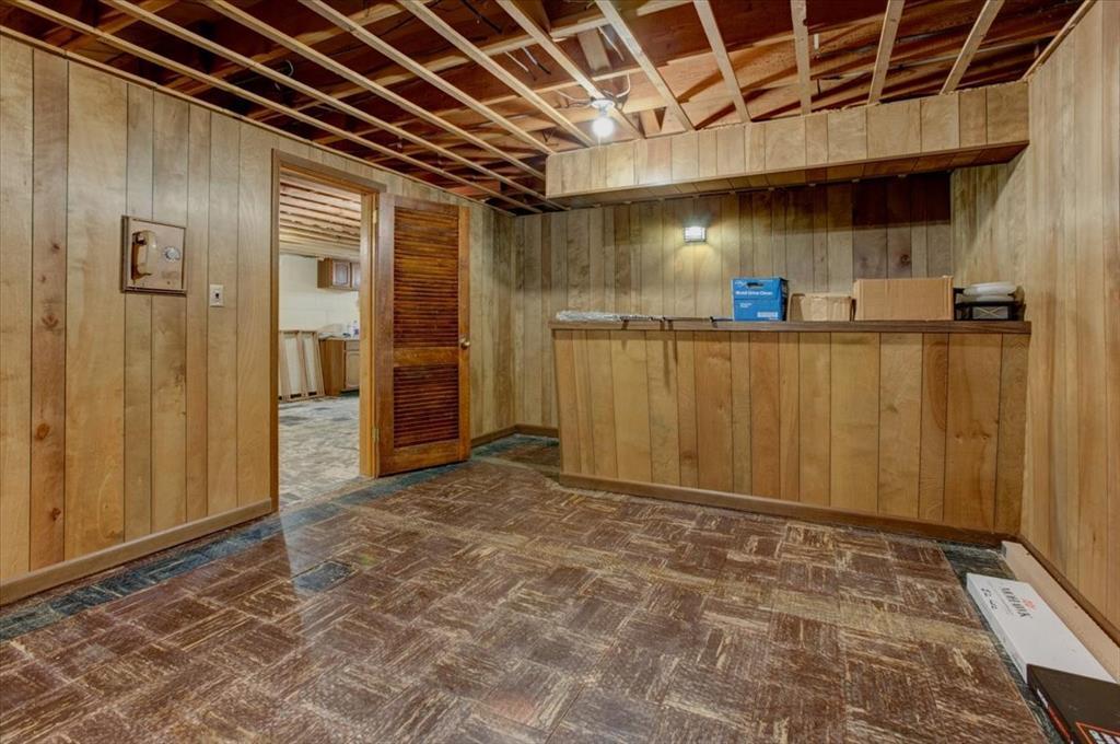 It already includes a wood-burning fireplace, bar area, and full bathroom-making it an ideal spot for gatherings. f