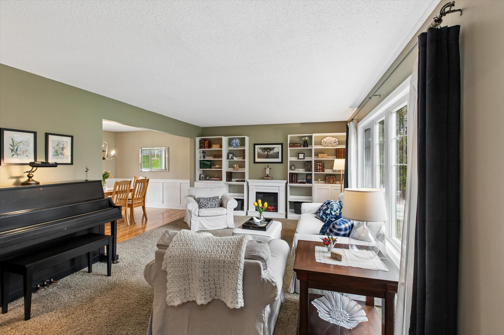 Living Room flows into the dining room.