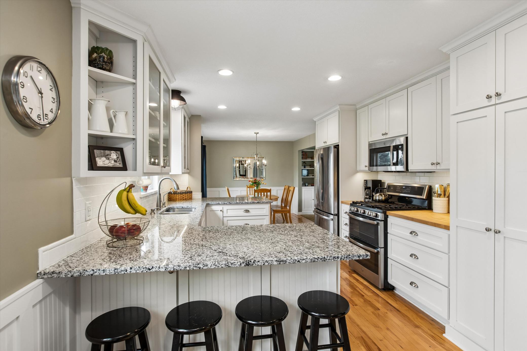 Kitchen with Glass door Cabinets.