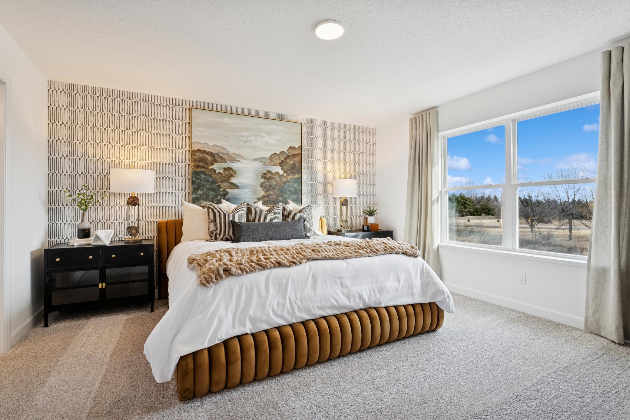 (Photos of model home, finishes will vary) The owner’s suite is situated on the home’s second level, comprised of a restful bedroom, en-suite bathroom and walk-in closet.