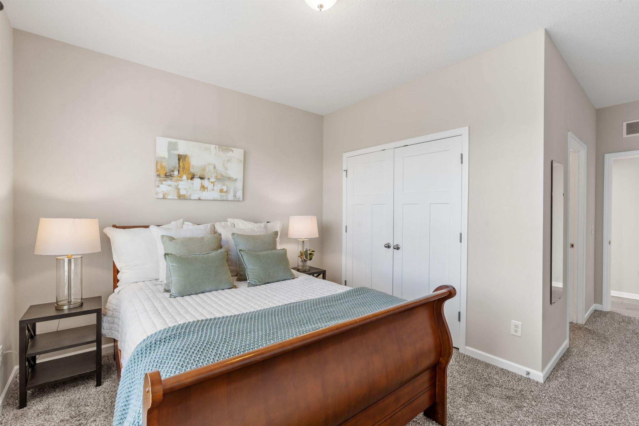 Soft, modern tones and a generous layout make this secondary bedroom a welcoming space for family or overnight visitors.